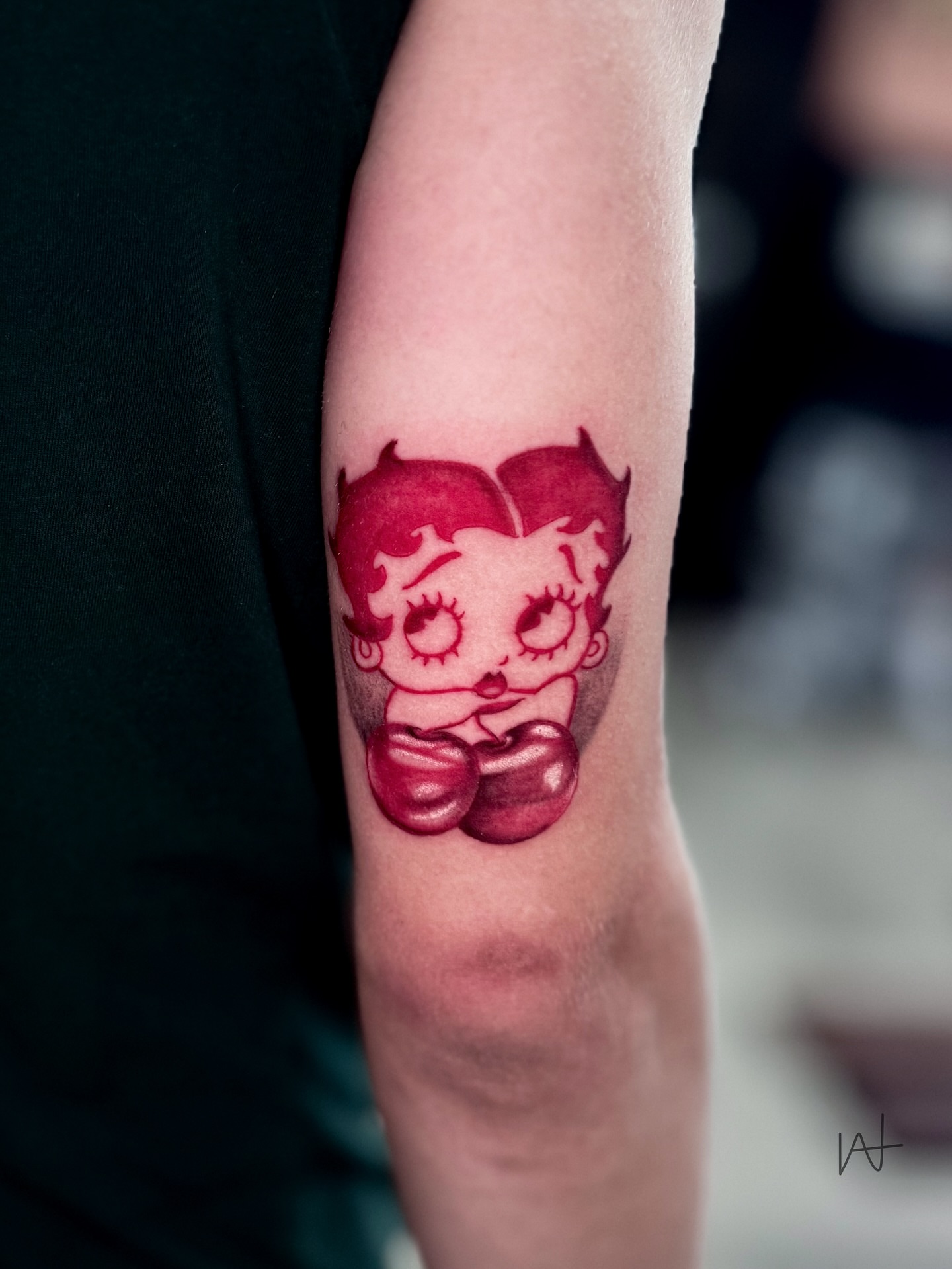 Betty Boop American traditional tattoo on the forearm by Kat Parmu