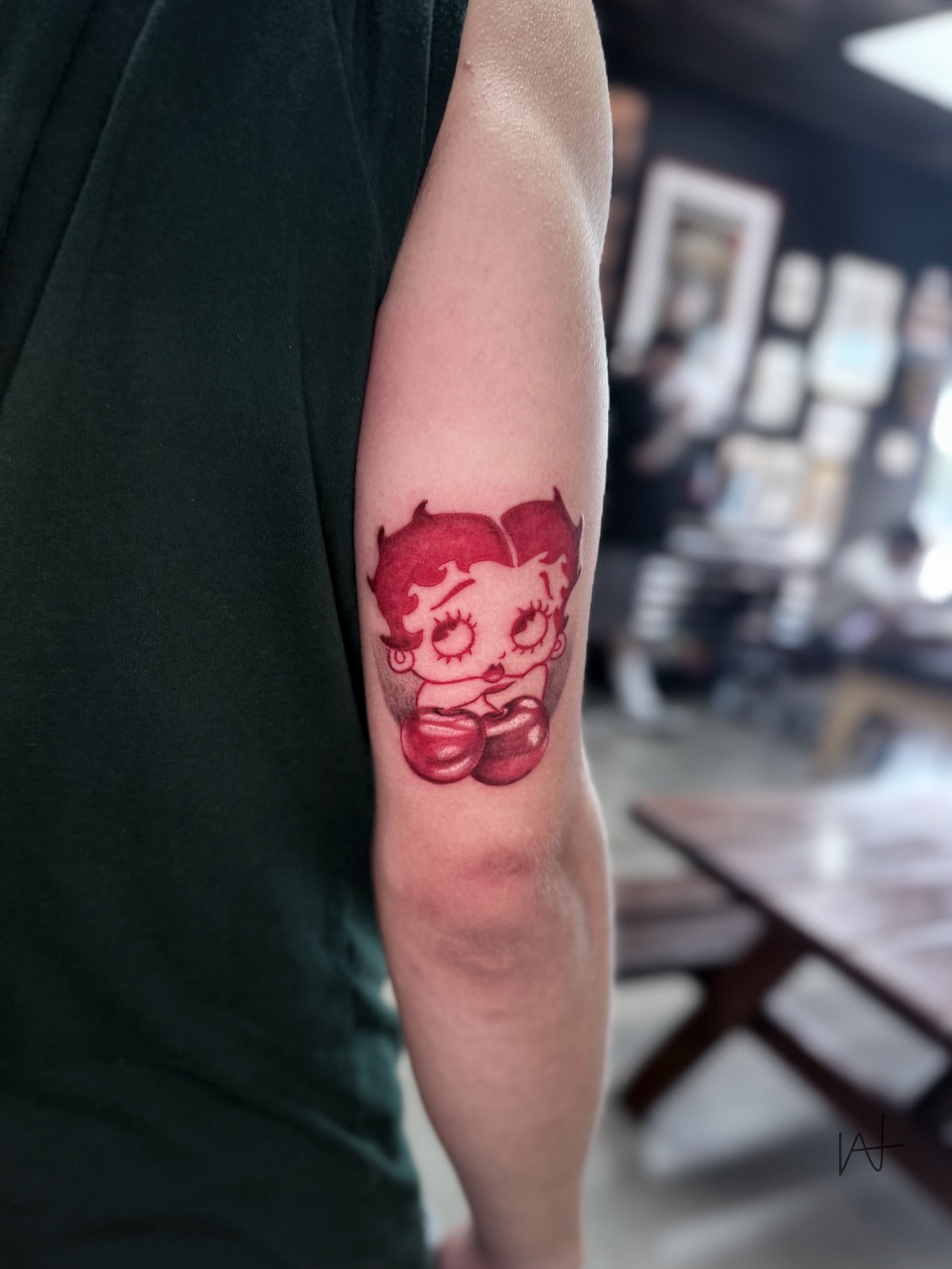 Betty Boop American traditional tattoo on the forearm by Kat Parmu