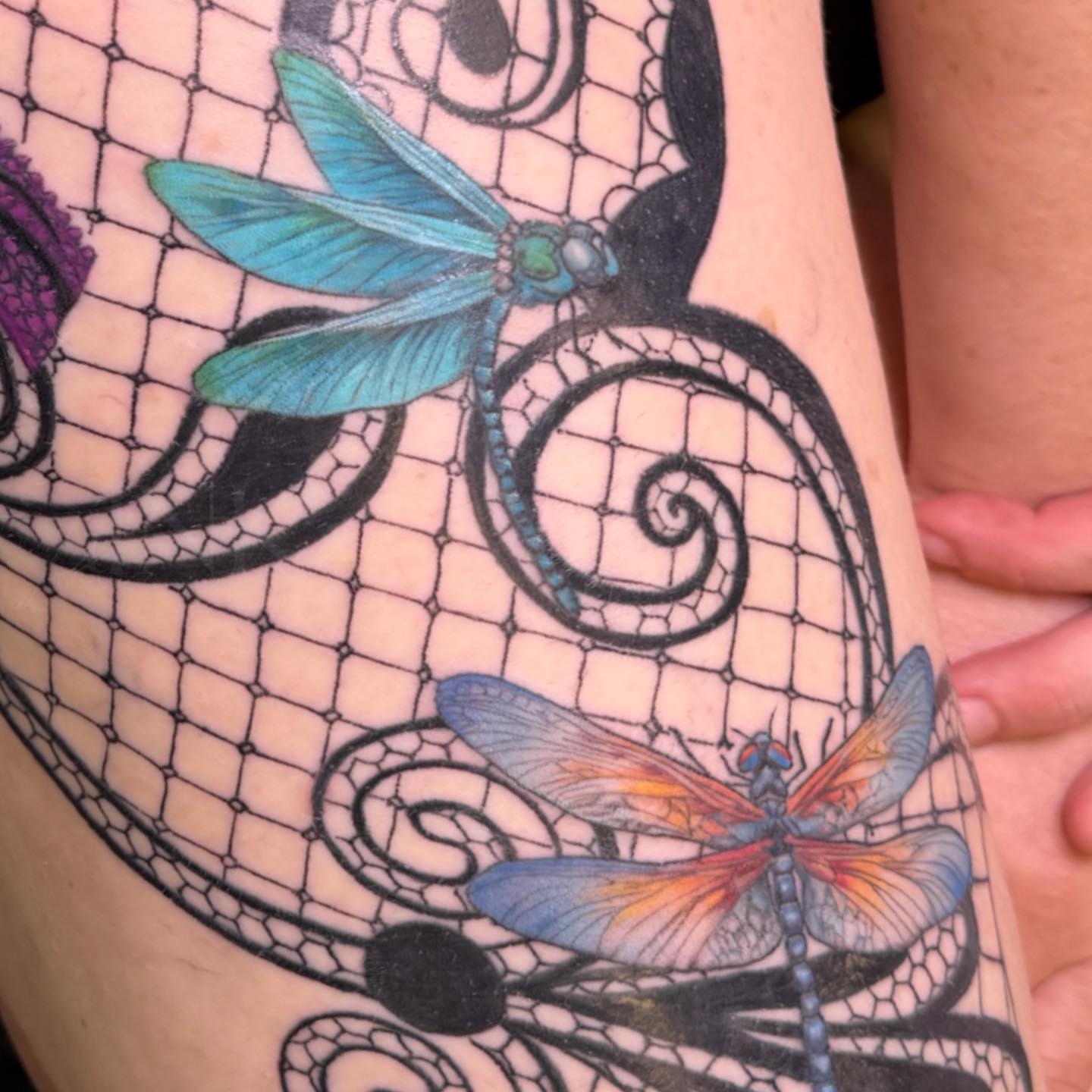 Dragonflies realism tattoo on the forearm by PxINK, Crystal, Minnesota
