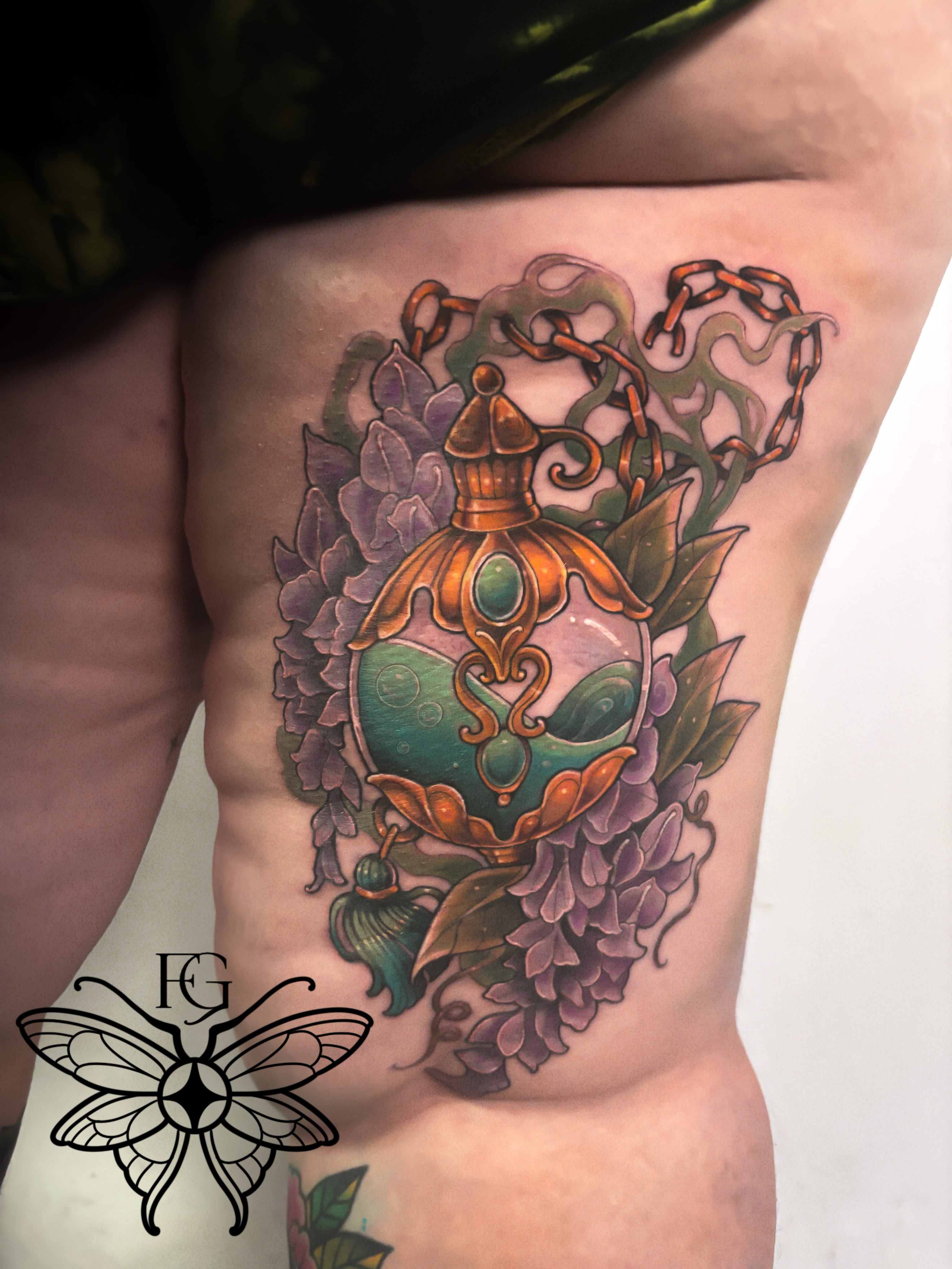 Lamp and wisteria illustrative tattoo on the ribs by Fairy Gremlin