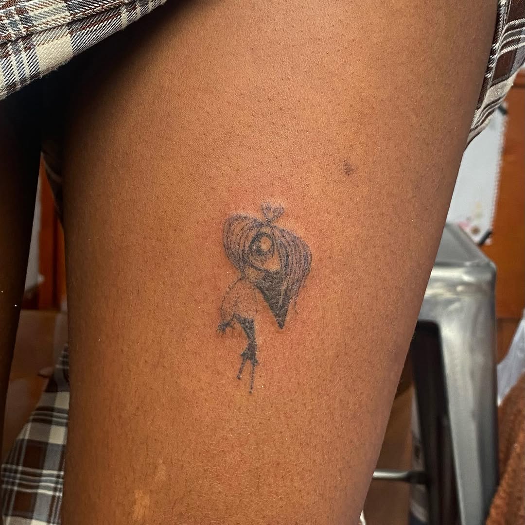 Character with large head sketch tattoo on the thigh by @feverfeverish