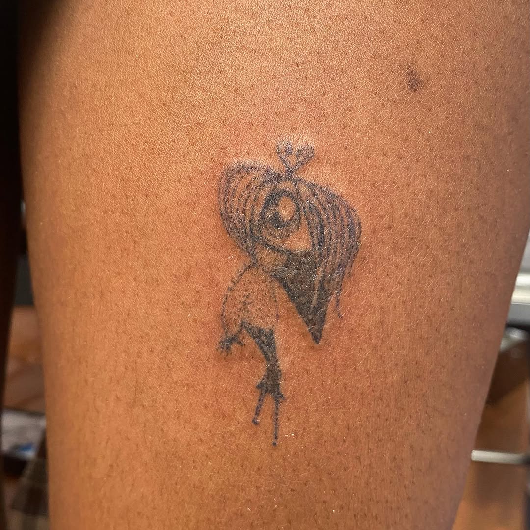 Figure with wings sketch tattoo on the thigh by @feverfeverish