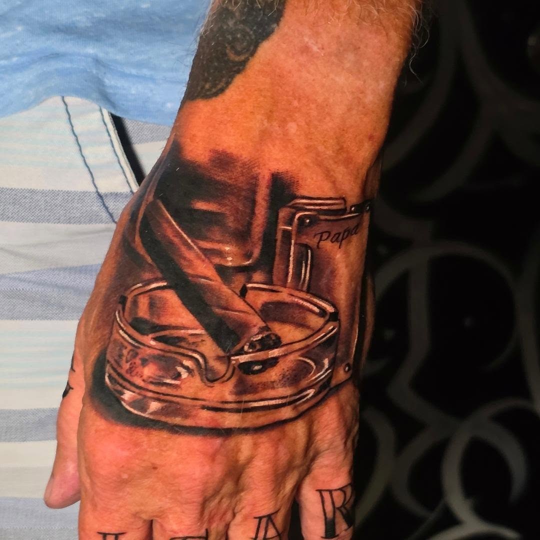Motorcycle engine realism tattoo on the hand by Tattoo Seez, Wichita, Kansas