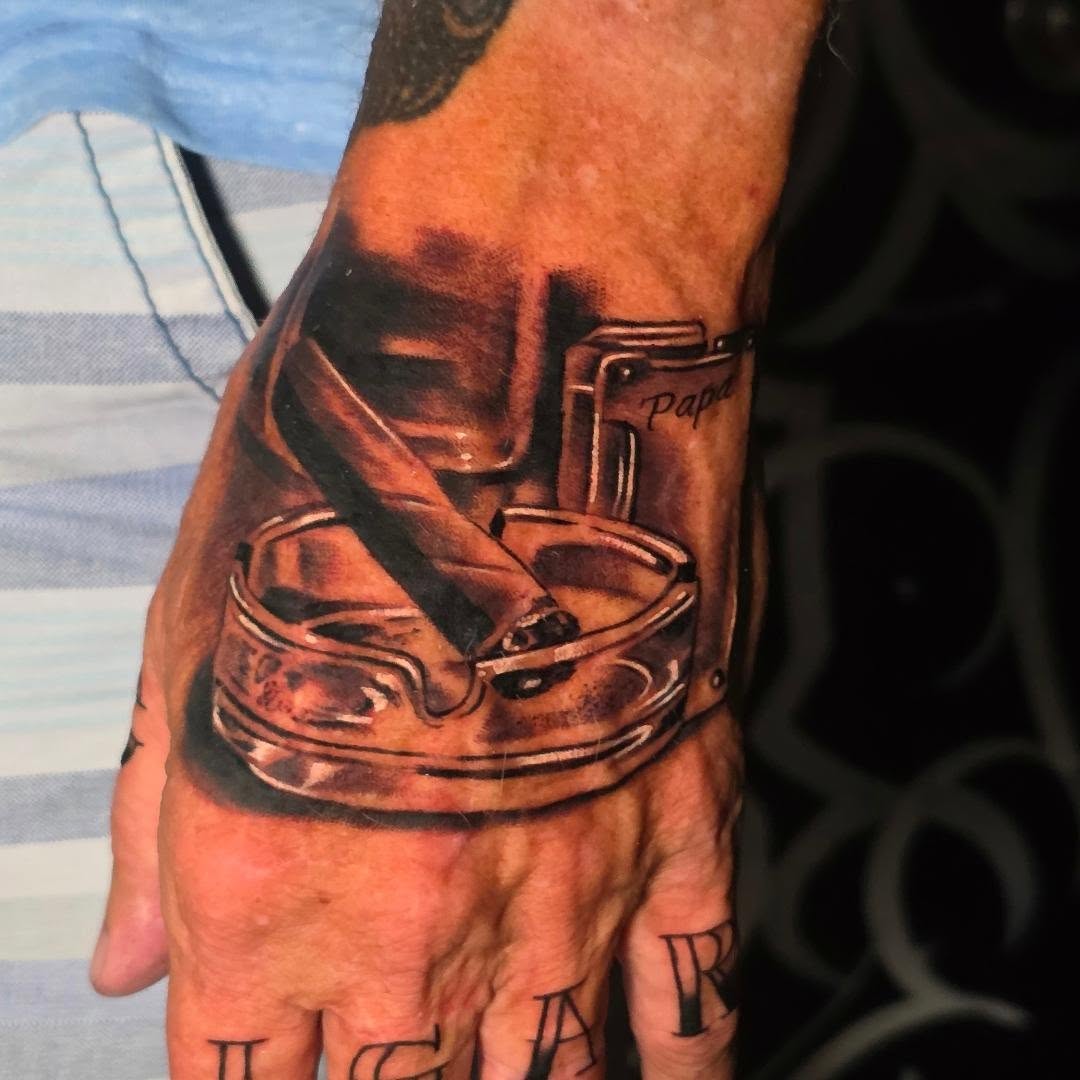 Pistons realism tattoo on the hand by Tattoo Seez, Wichita, Kansas