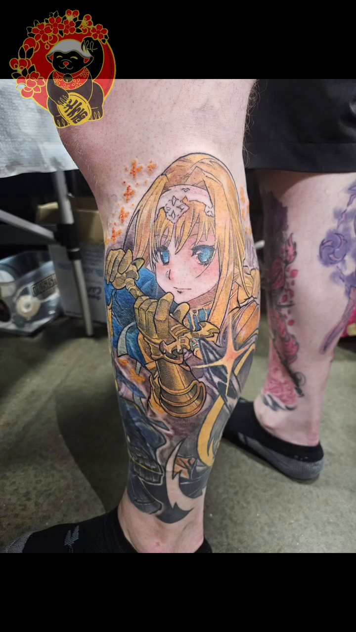 Anime character on leg tattoo on the forearm by Lillian Honeybadger