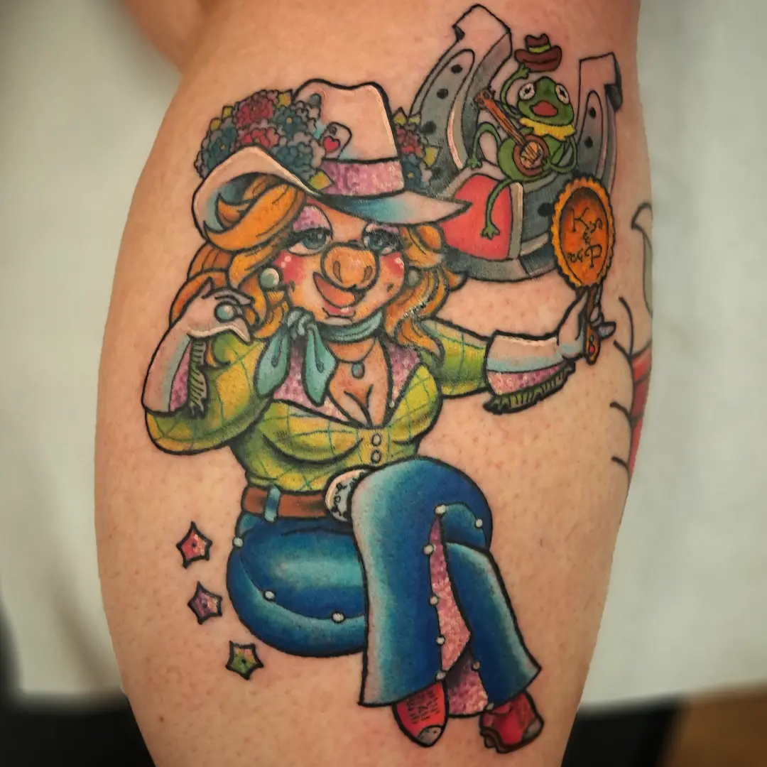 Cowgirl clown American traditional tattoo on the thigh by Erika Hollingsworth