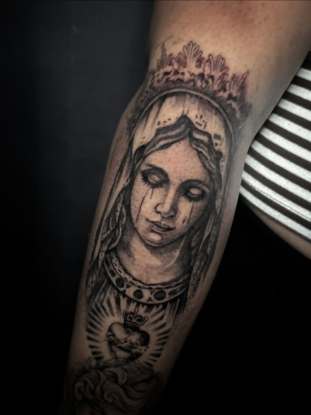 Virgin Mary with Sacred Heart realism tattoo on the forearm by Marky