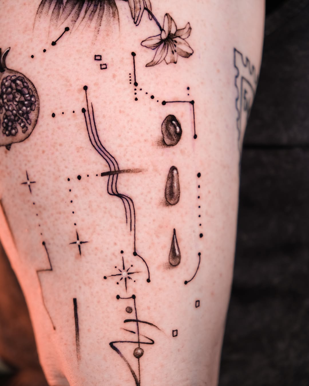 Abstract geometric elements with botanical details geometric tattoo on the thigh by Tattoo Miami π
