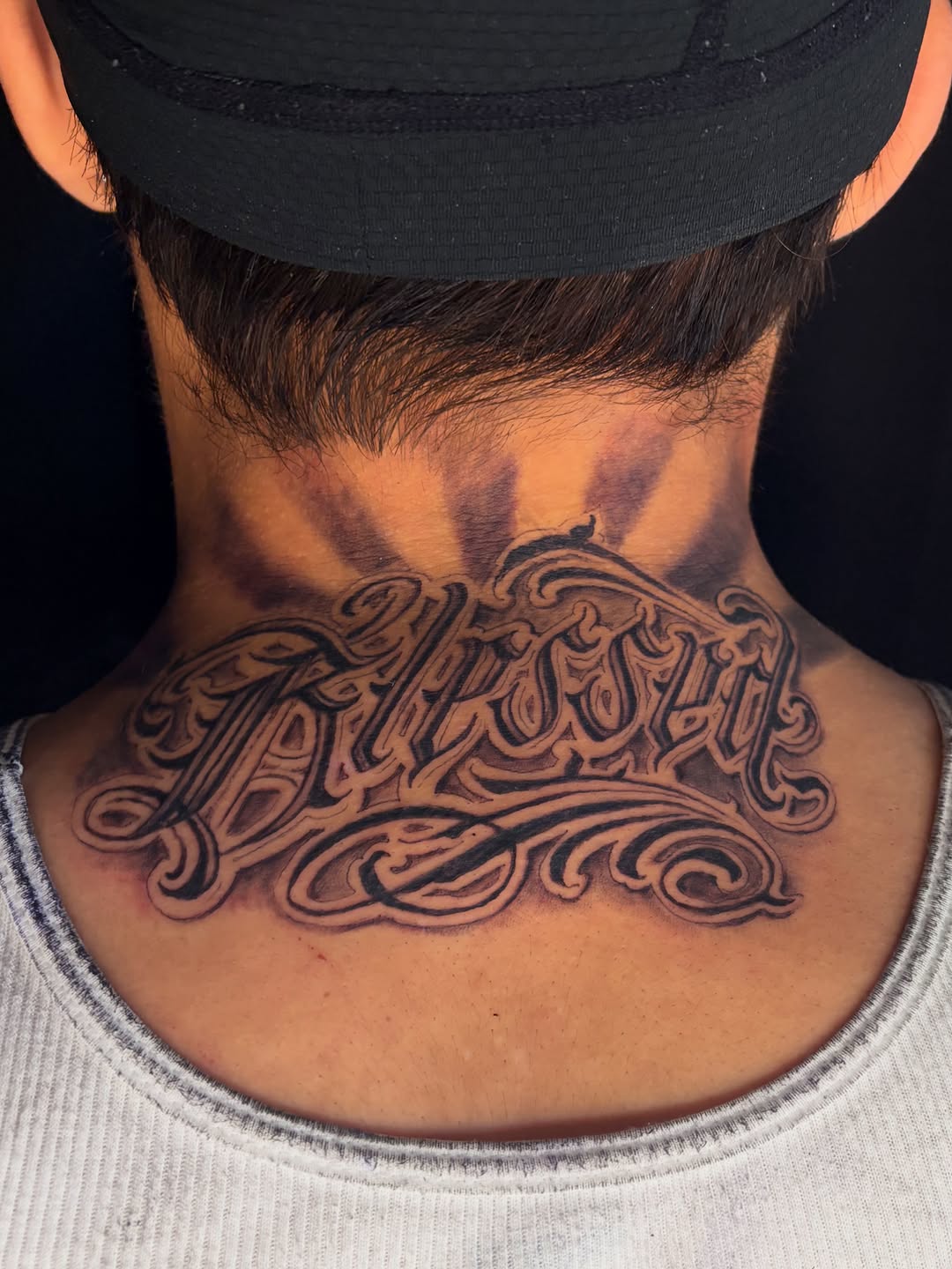 Tattoo by @inkedbyhades — lettering_script, chicano