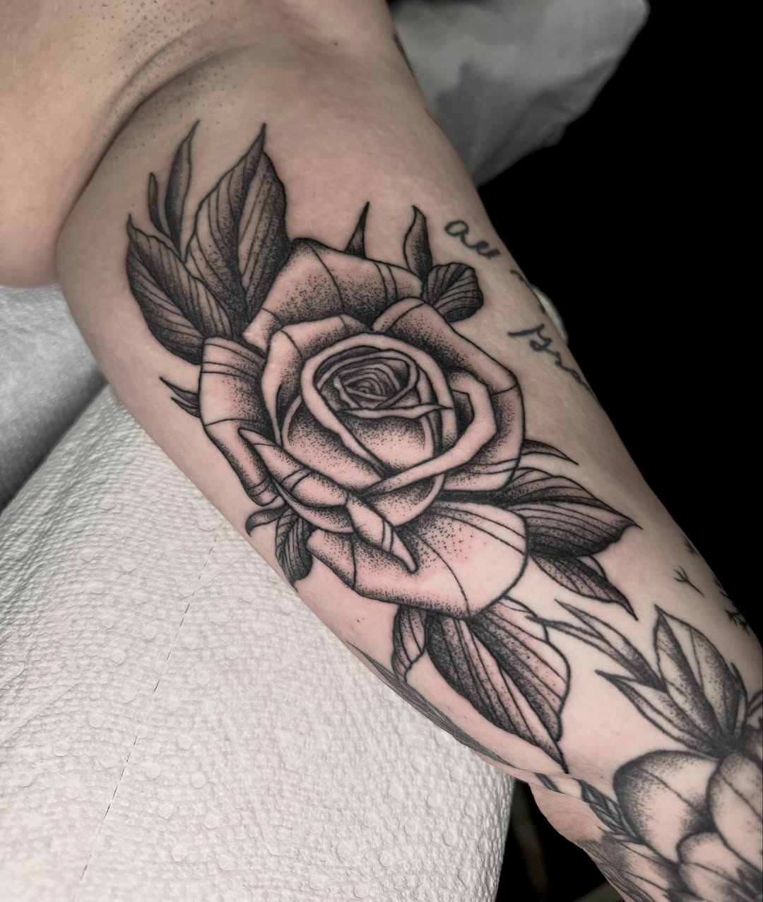 Rose and leaves dotwork tattoo on the forearm by @michaelryan_tattoo