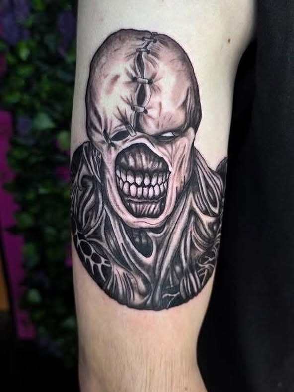 Horror mask dark realism tattoo on the forearm by Sabrina