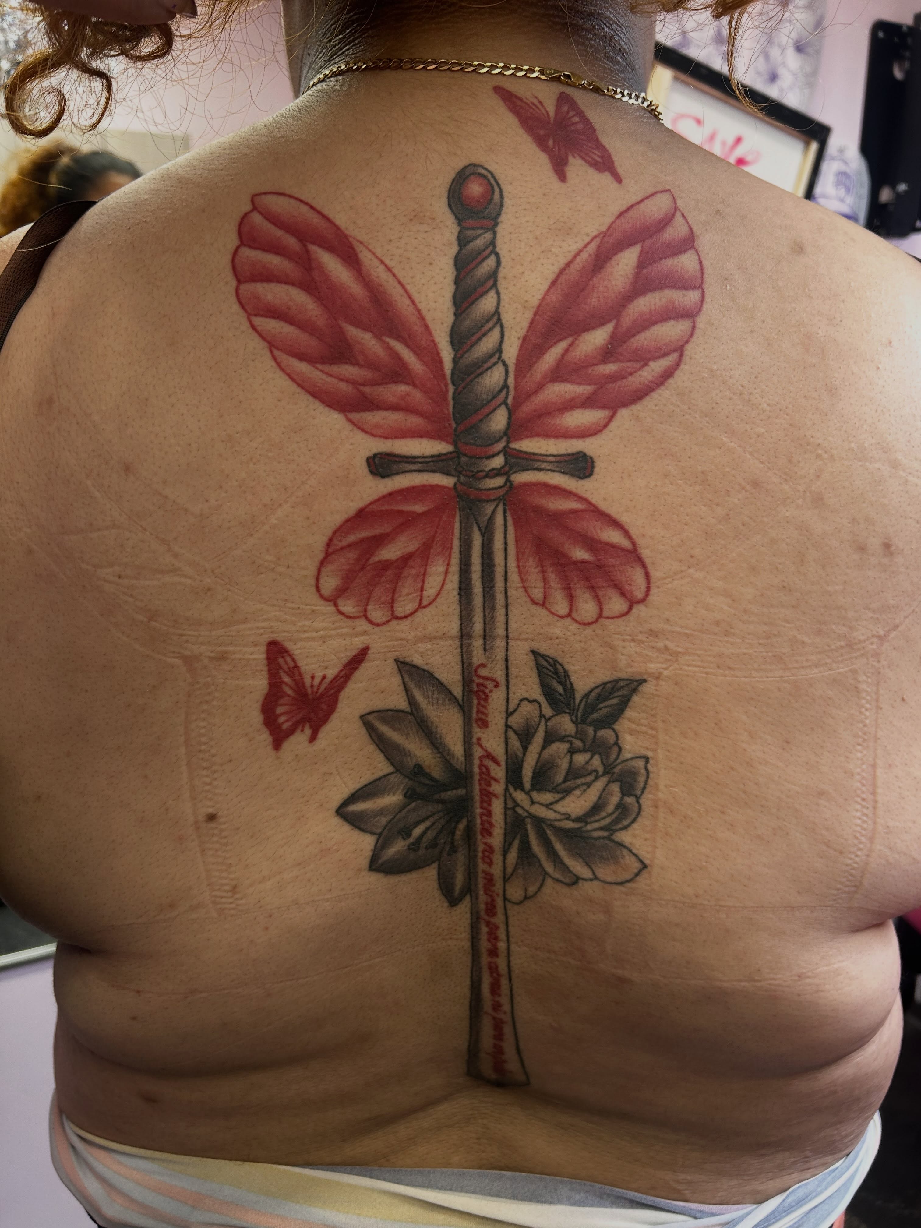 Butterfly and sword neo-traditional tattoo on the back by Big Mar, Rocky Hill, Connecticut