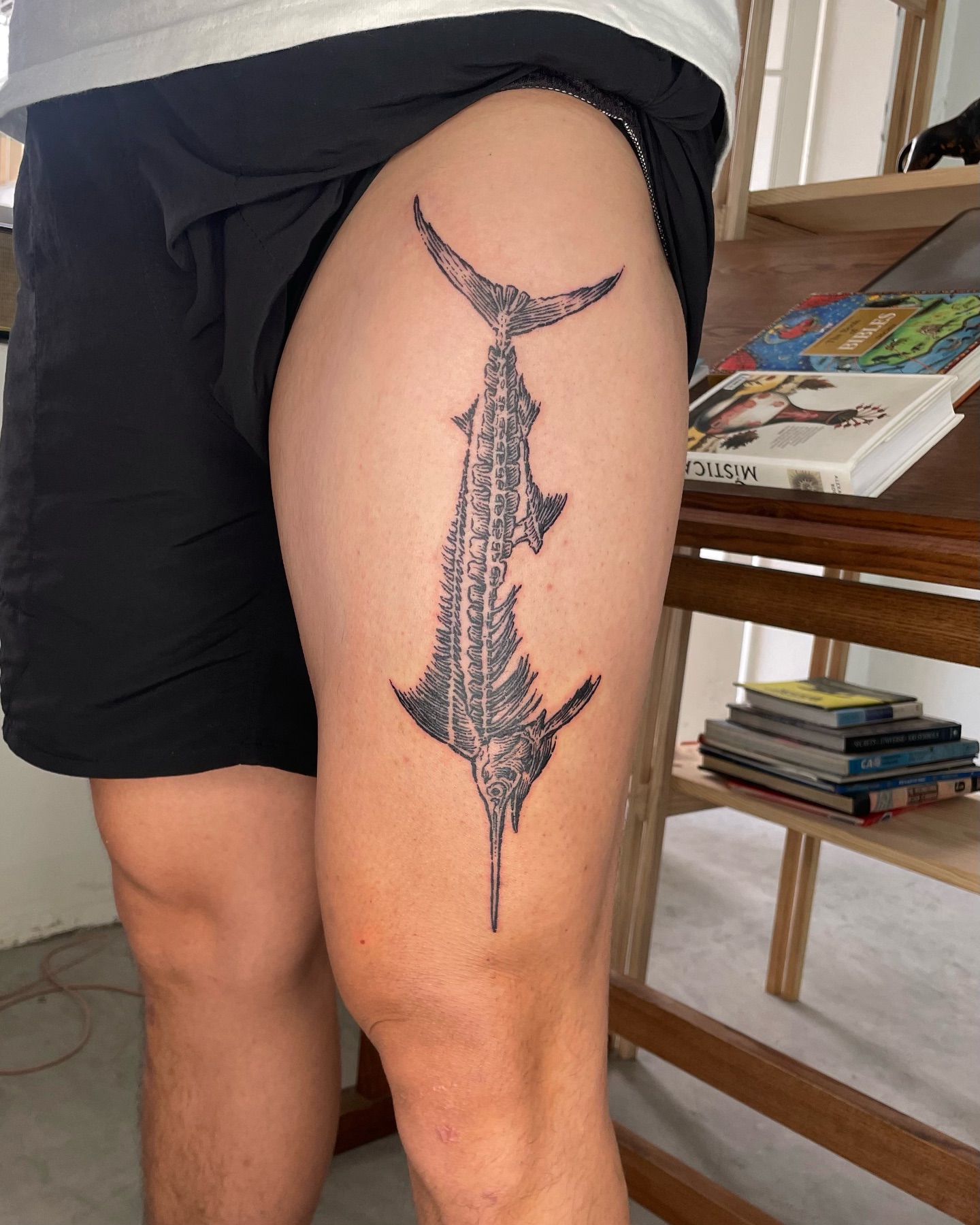 Swordfish black and grey tattoo on the thigh by Anh Đan