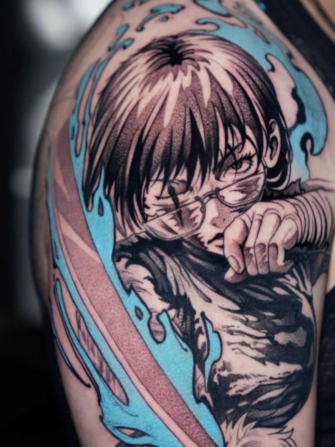Anime character anime tattoo on the upper arm by CRISTIAN AMORES シ