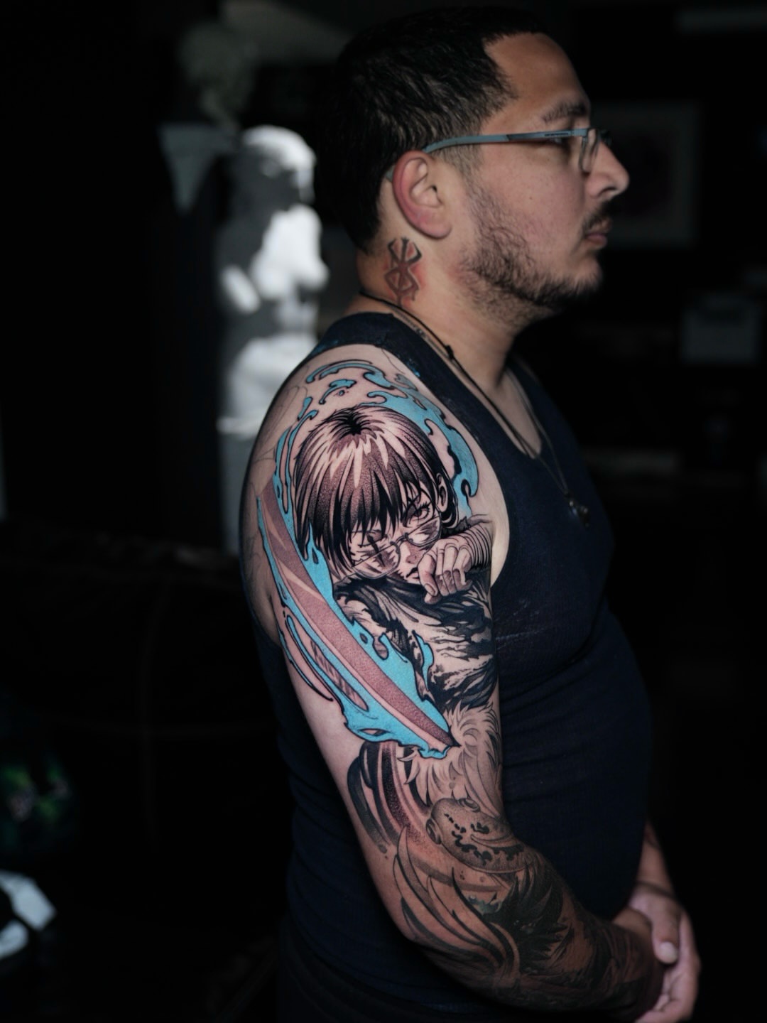 Anime character anime tattoo on the upper arm by CRISTIAN AMORES シ