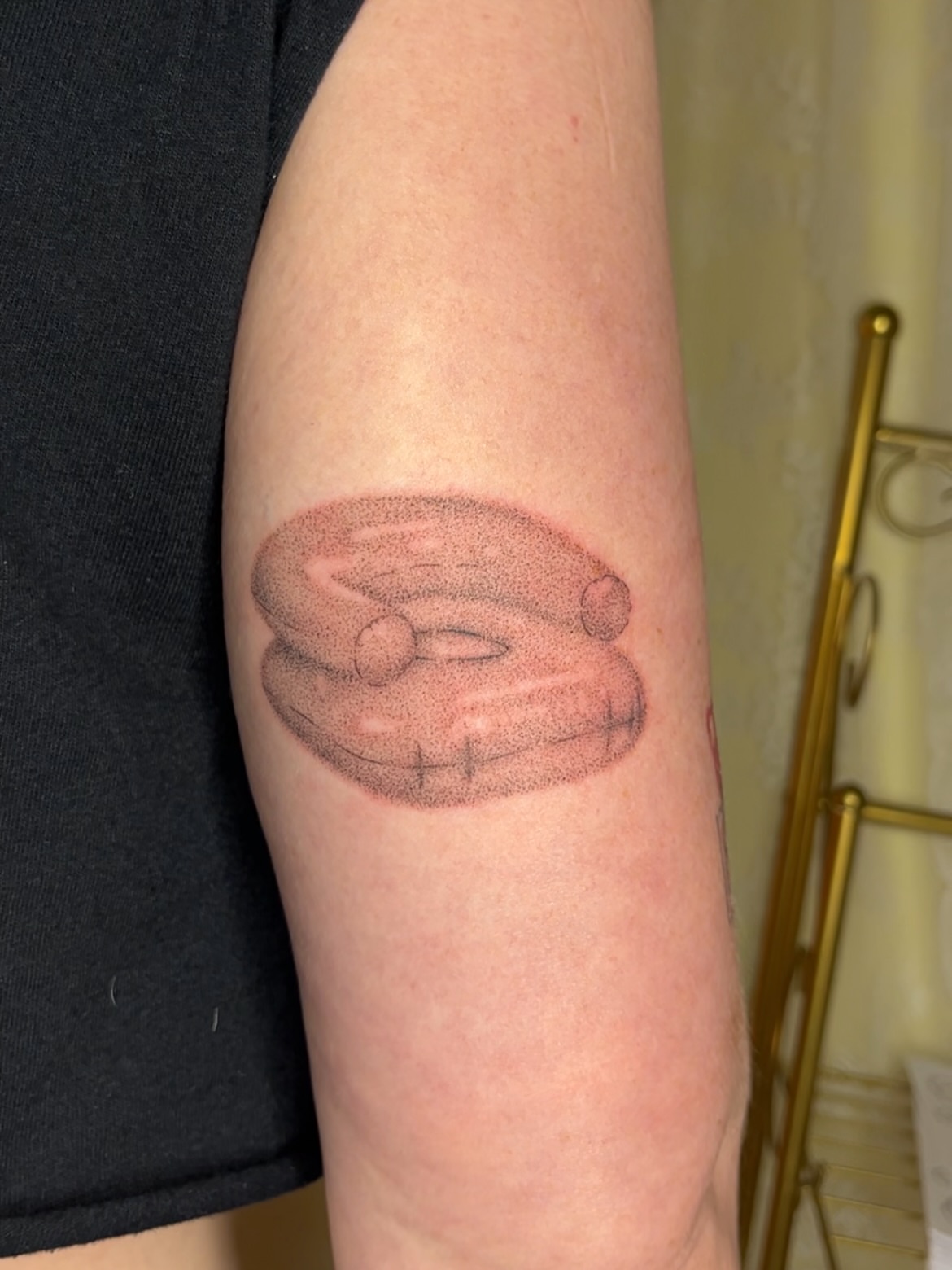 Inflatable ring dotwork tattoo on the forearm by mia