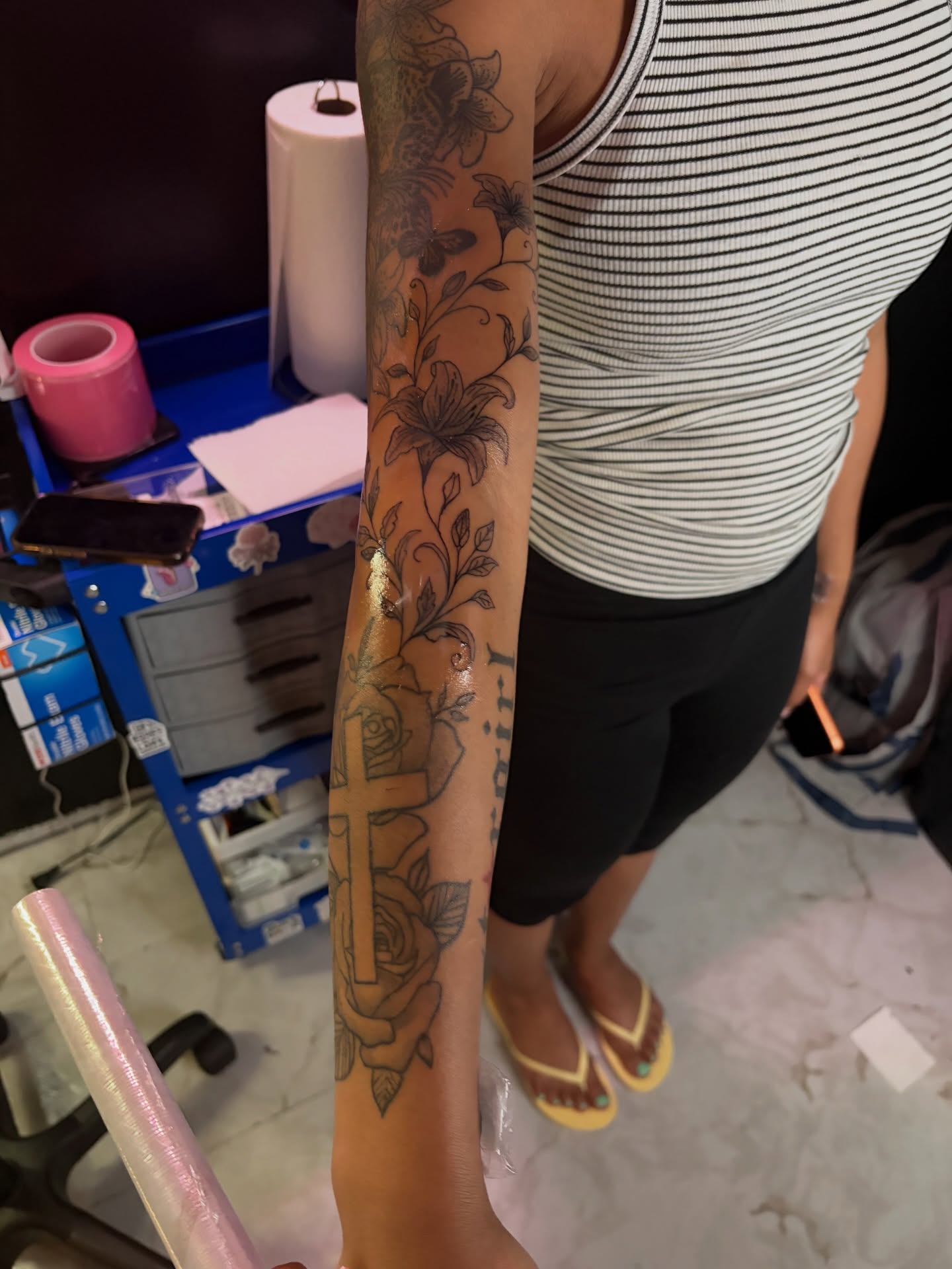 Cross and floral American traditional tattoo on the forearm by Meela Inks ๐, Richmond, Virginia