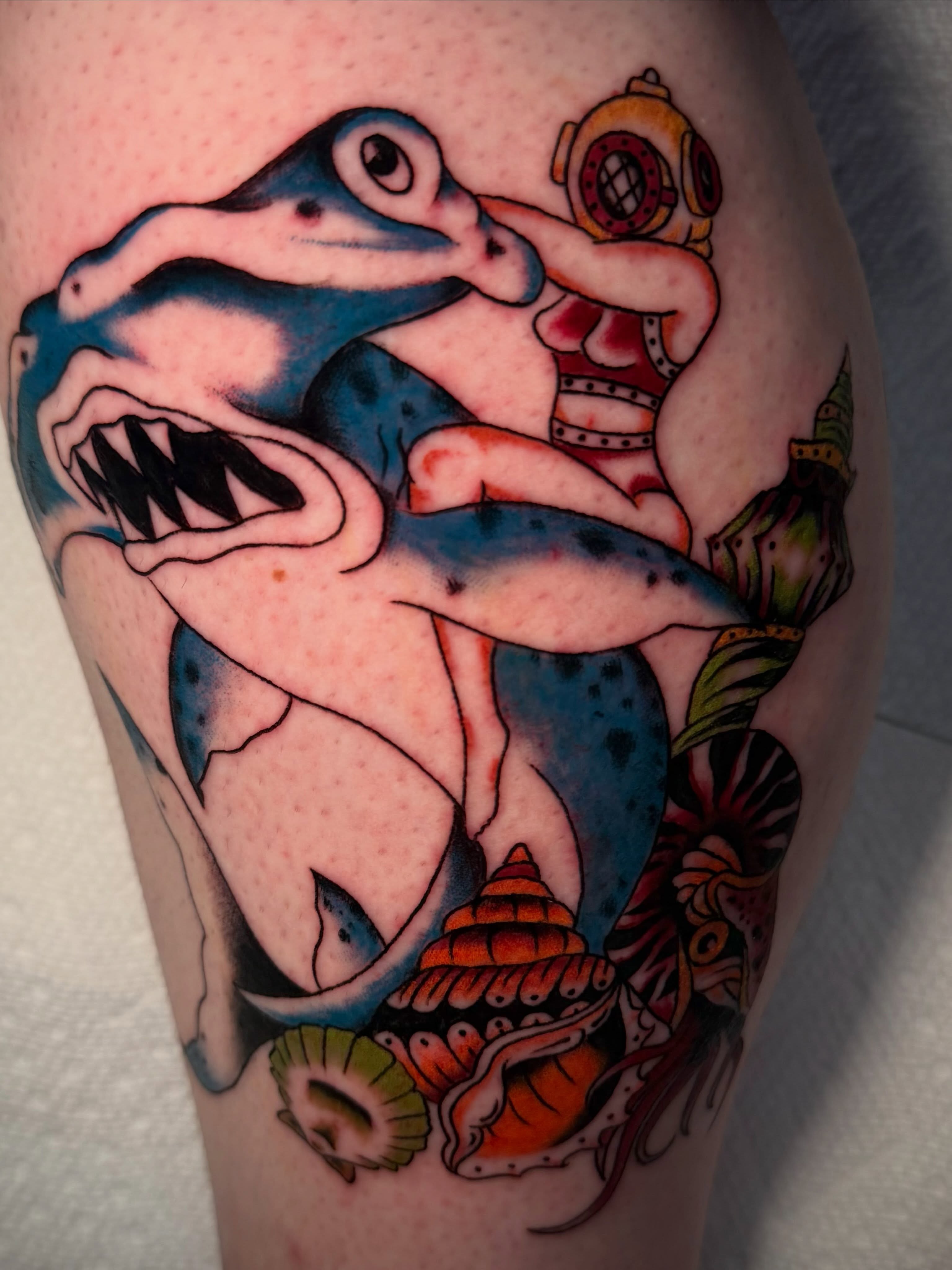 Shark and octopus American traditional tattoo on the thigh by Lydia