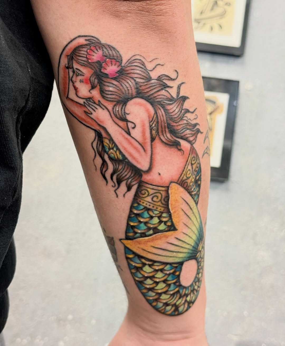 Mermaid American traditional tattoo on the forearm by Chris