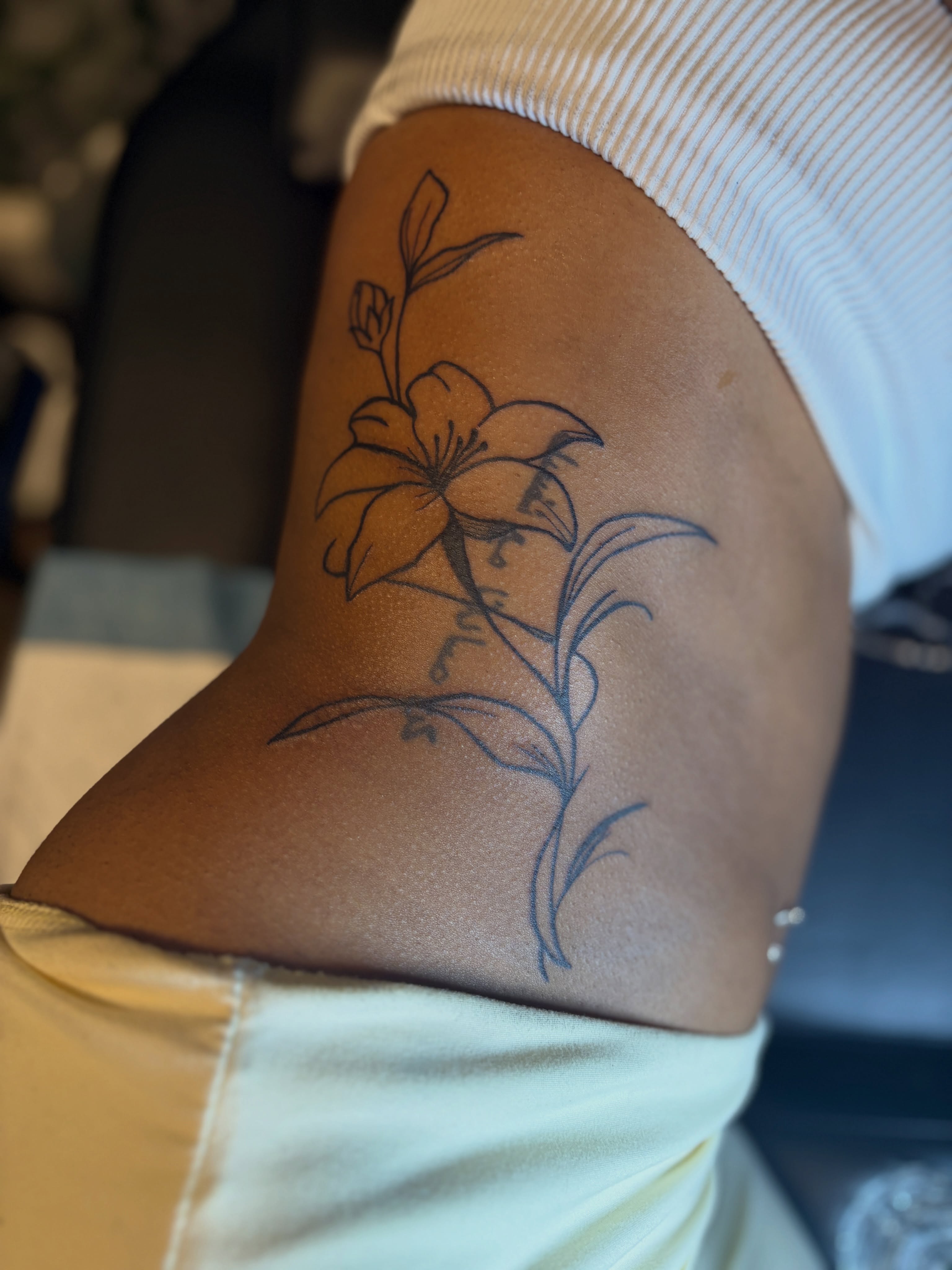 Lily black and grey tattoo on the thigh by Khemar InspiredByLife 🇯🇲