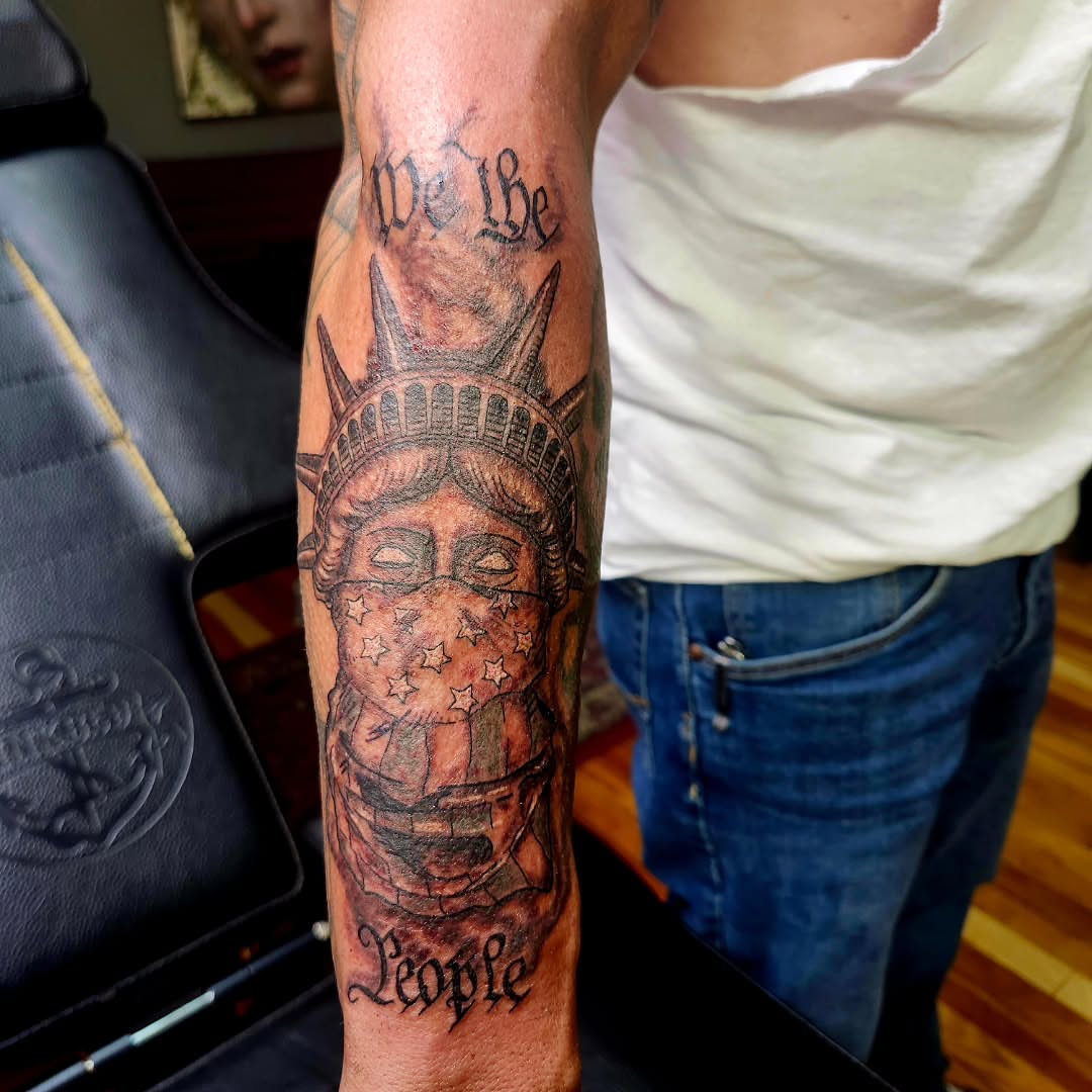 Statue of liberty realism tattoo on the forearm by @rockinr33d.tattoos