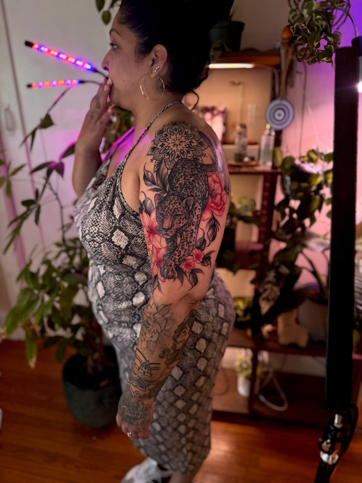 Floral and animal japanese irezumi tattoo on the upper arm by Angie Cotton