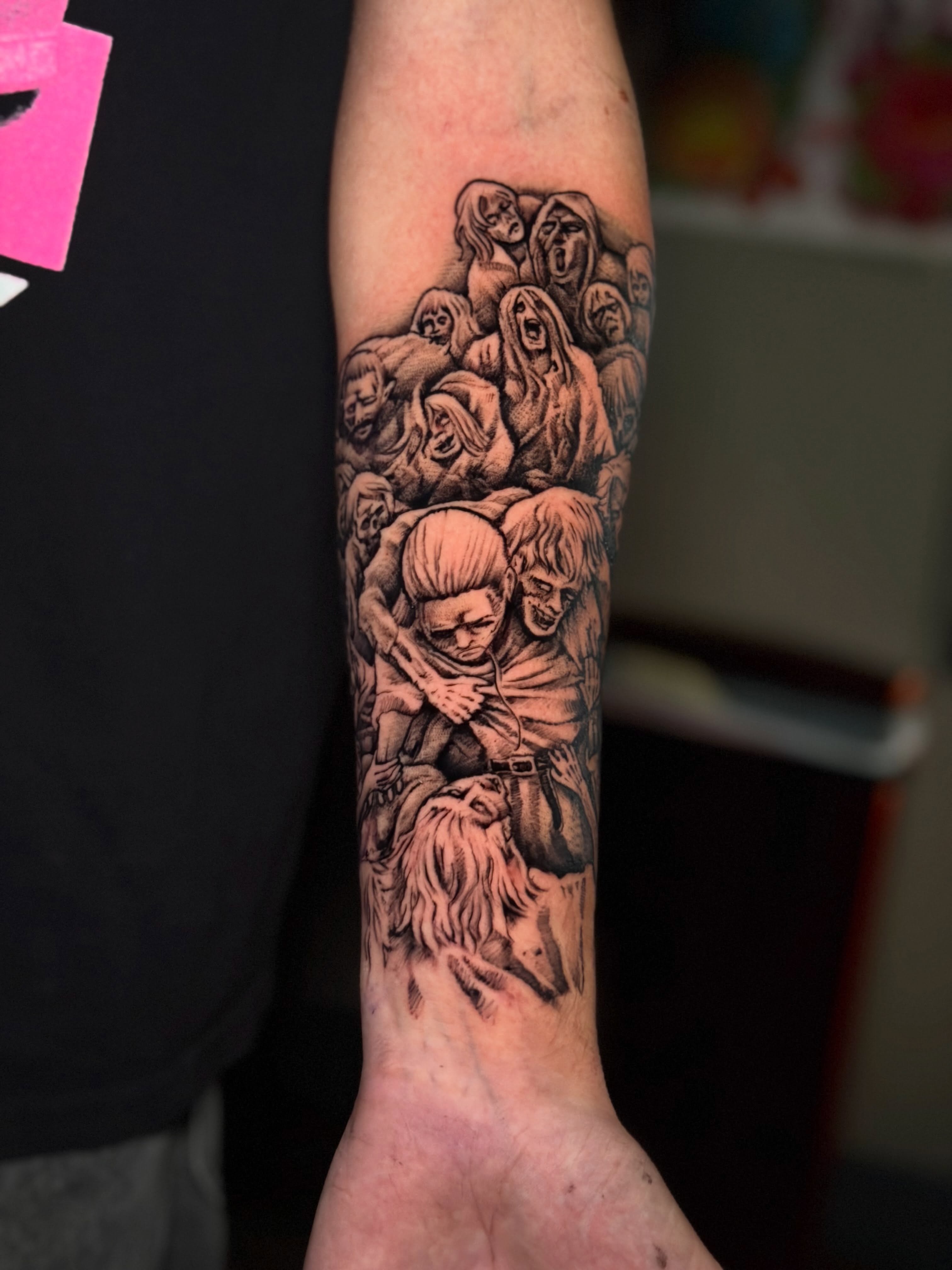 Zombies realism tattoo on the forearm by Adam Newton