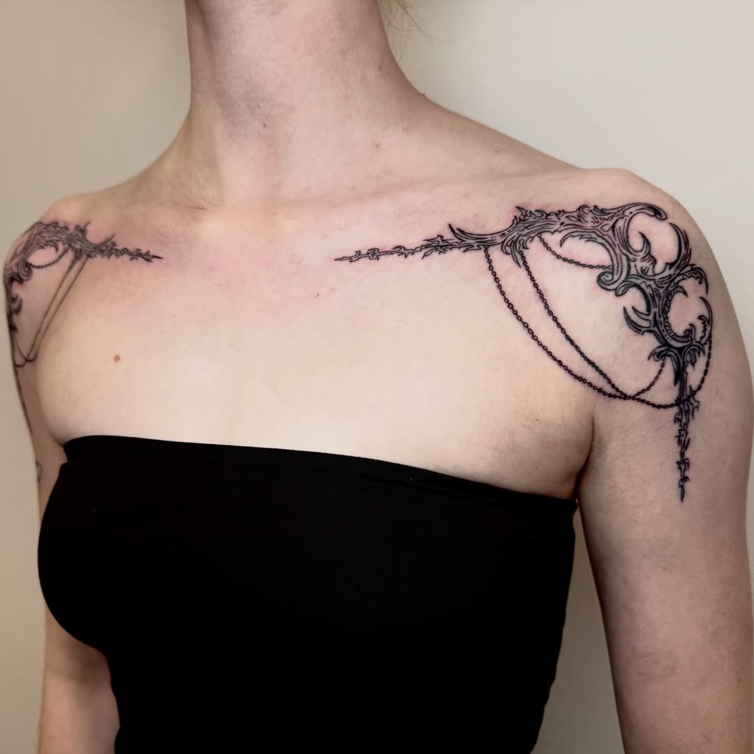 Key and chain black and grey tattoo on the shoulder by dev