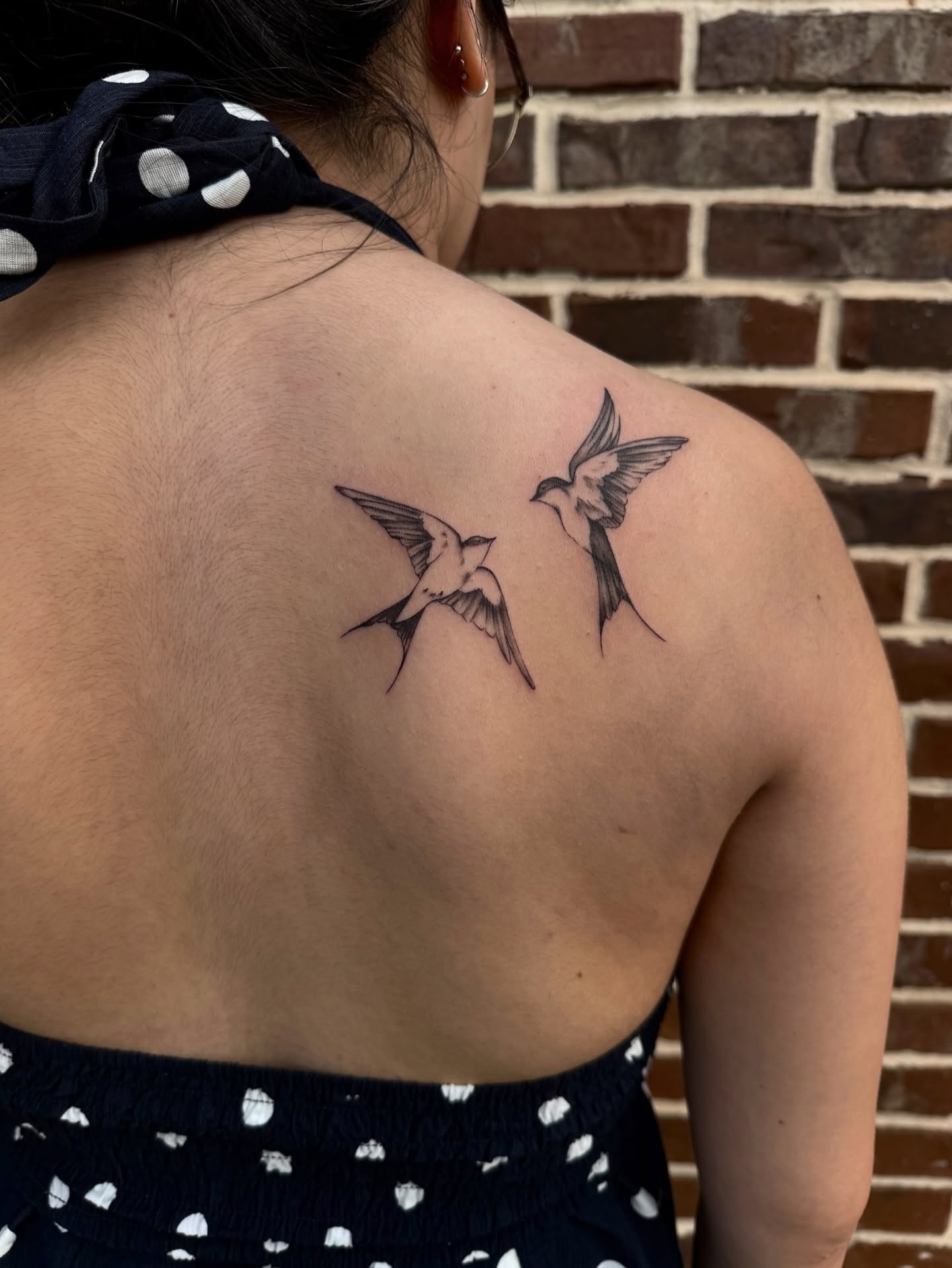 Swallows black and grey tattoo on the shoulder by @mexcellent_tattoos