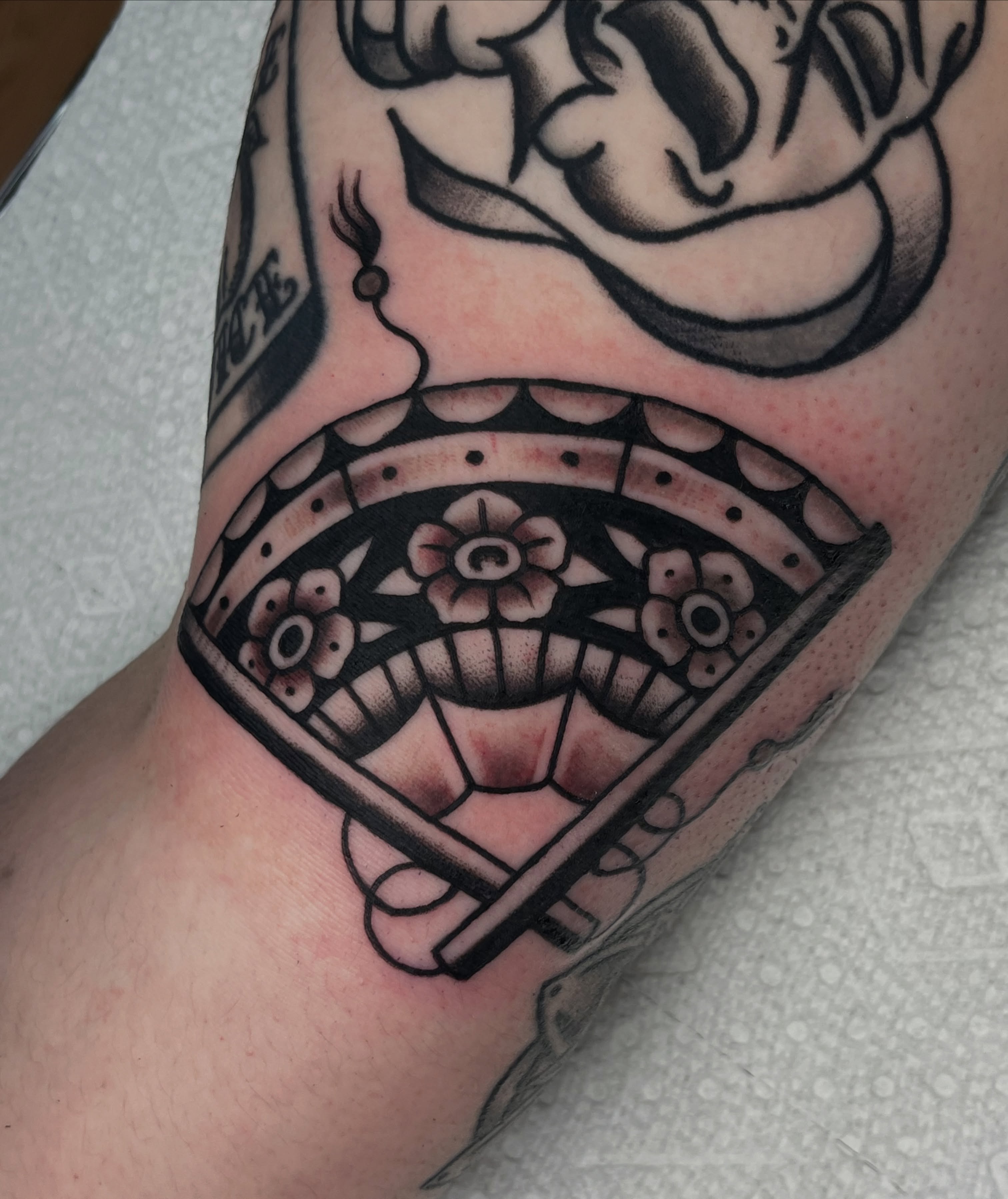 Sugar skull American traditional tattoo on the forearm by August B., Renton, Washington