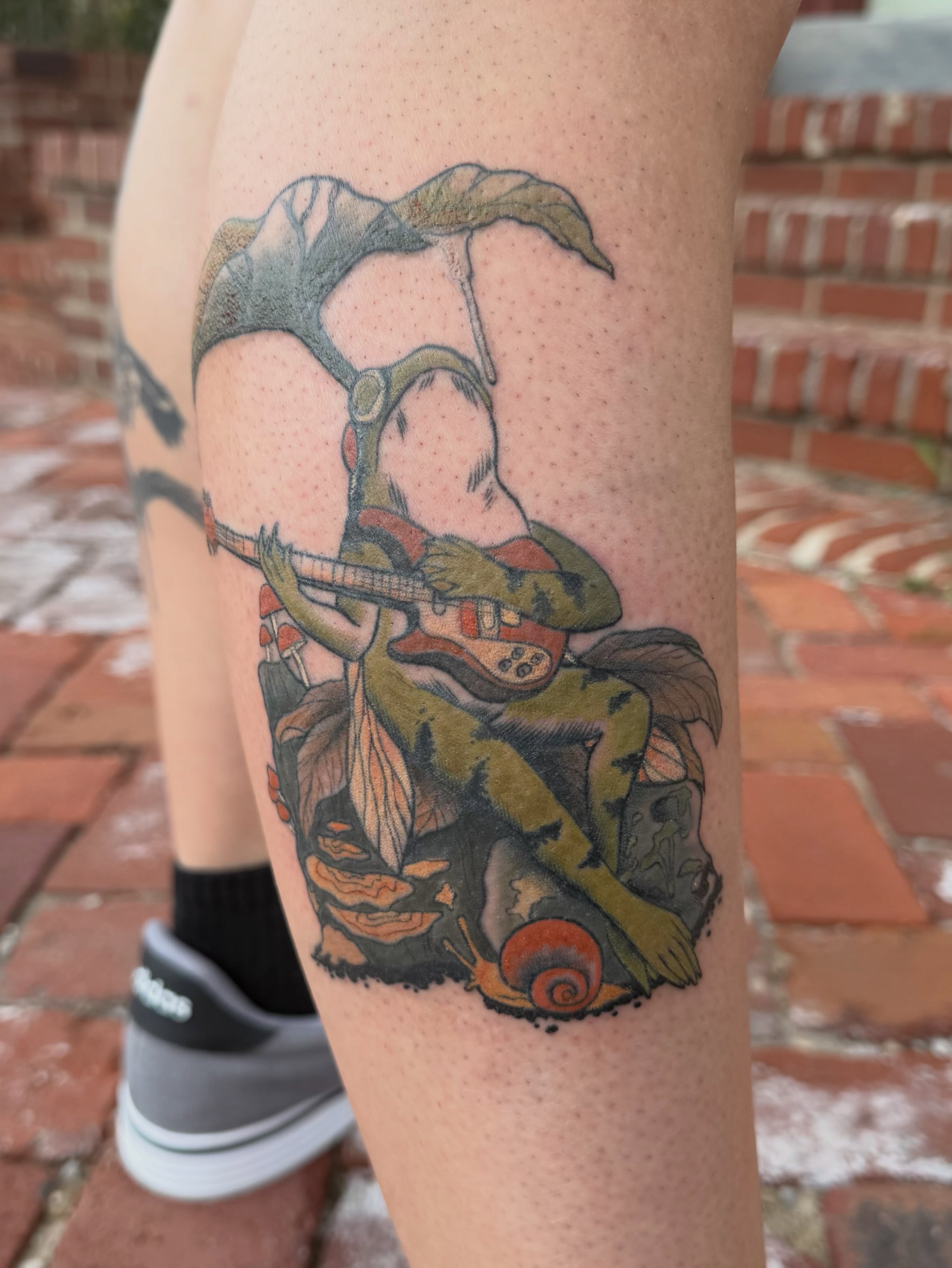 Frog playing guitar dotwork tattoo on the thigh by Bri ⚡️✨