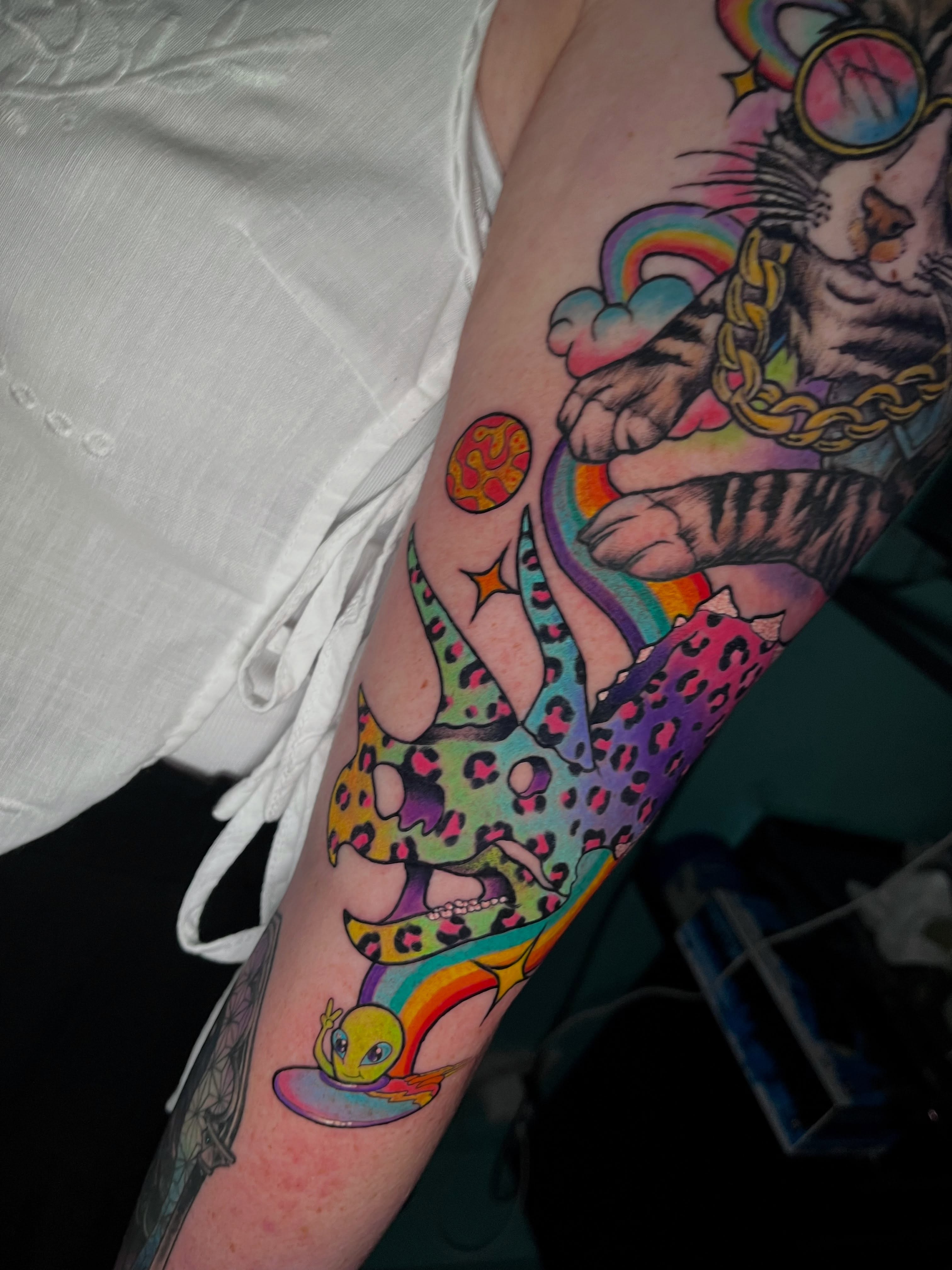 Tiger and rainbow new school tattoo on the forearm by Martha Gual π€ East ATX Tattooer