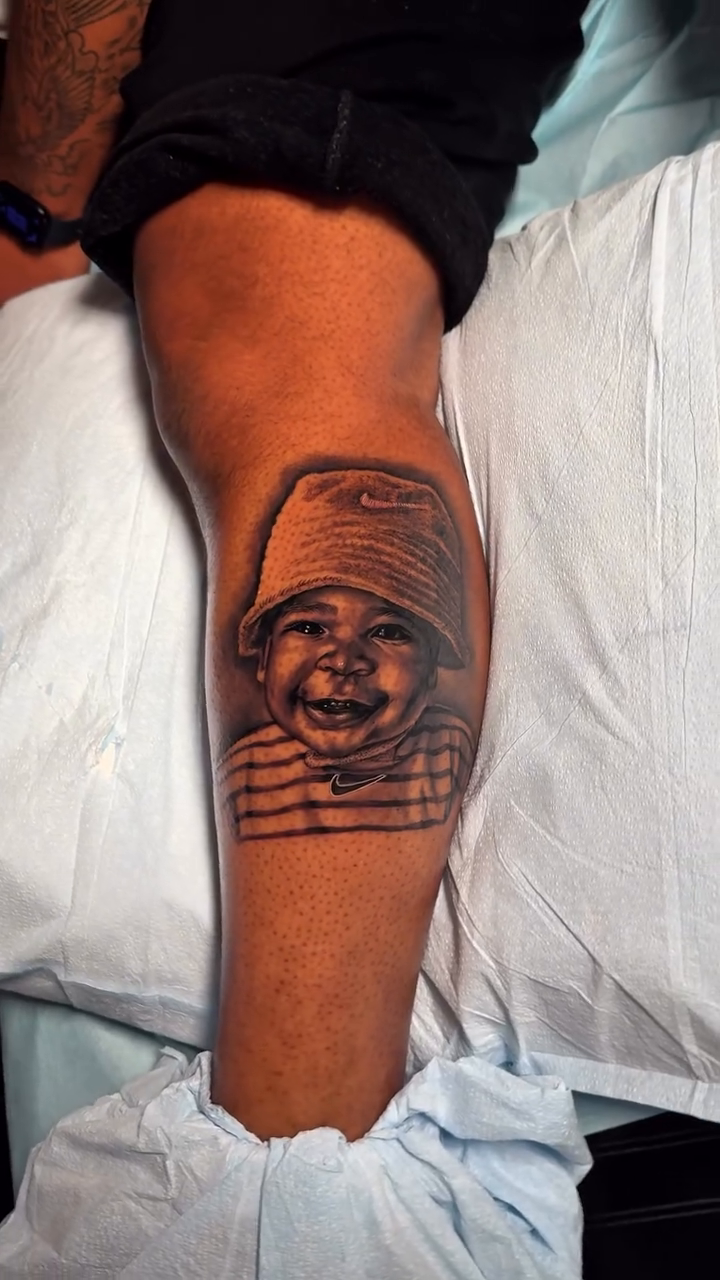 Tattoo by @heavyhitterbam — realism, black_and_grey