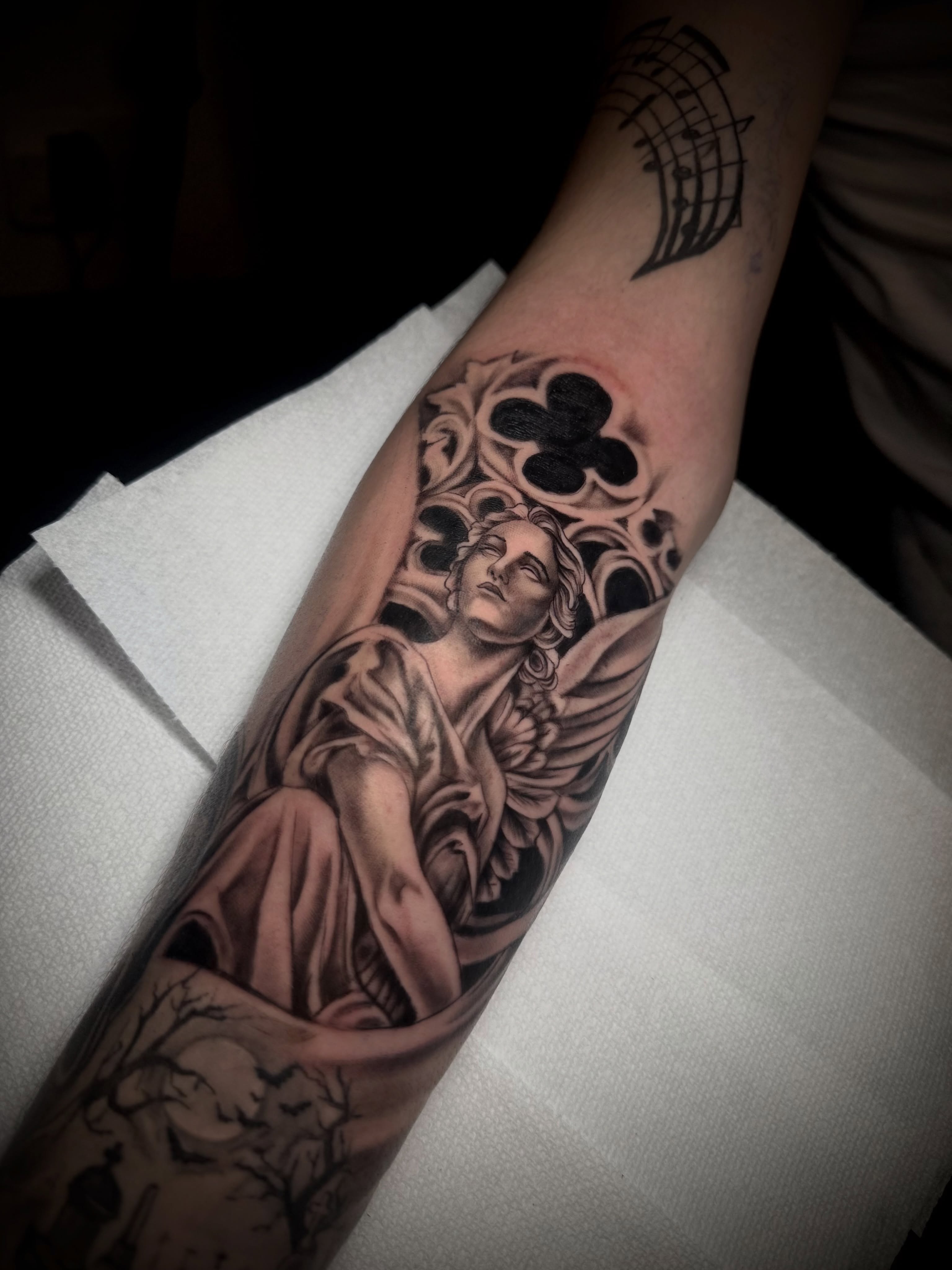 Angel with wings realism tattoo on the forearm by Andres Calvo🇺🇸🇨🇴