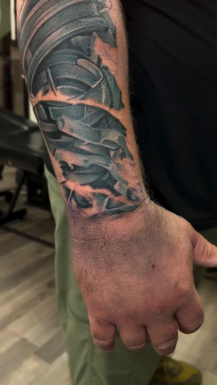 Tattoo by @radtattoo93 — realism, black_and_grey