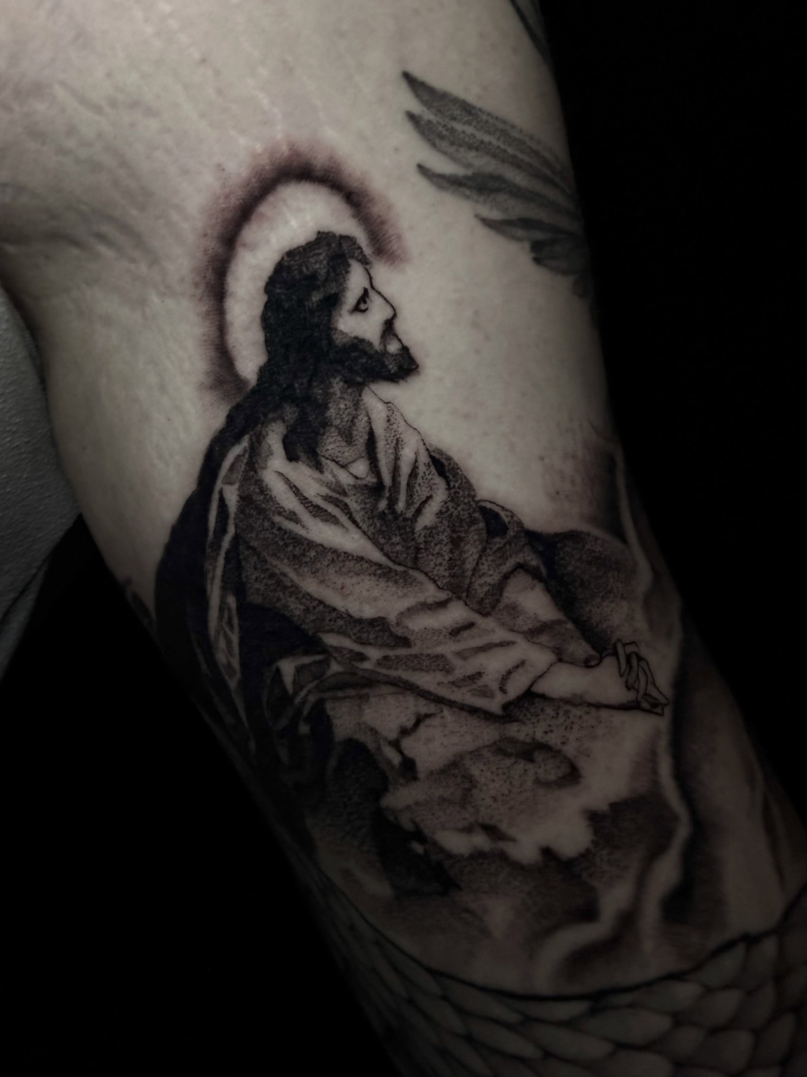 Religious figure realism tattoo on the forearm by Exploitedtattoos