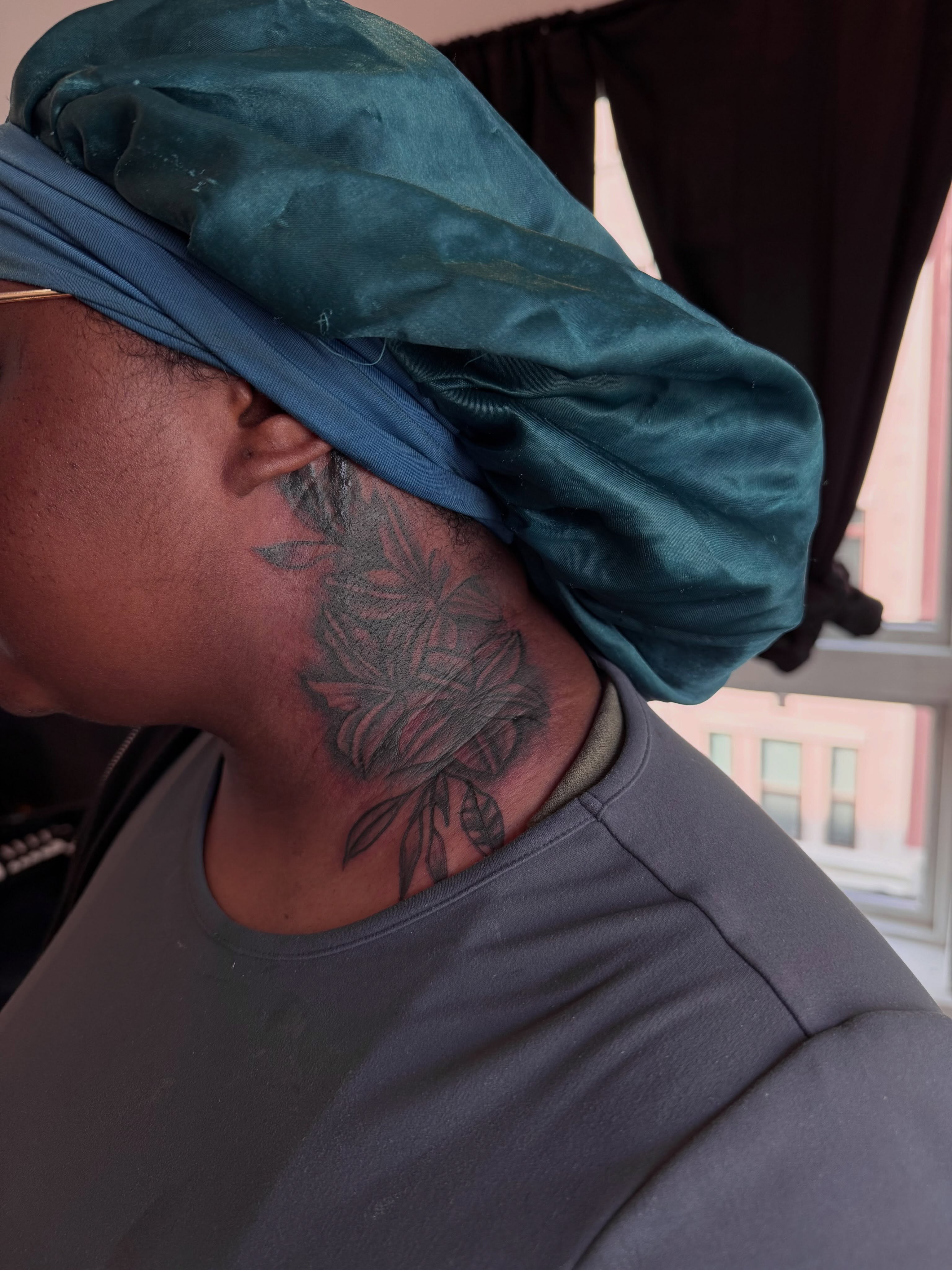Flower black and grey tattoo on the neck by inkedbylii, Philadelphia, Pennsylvania