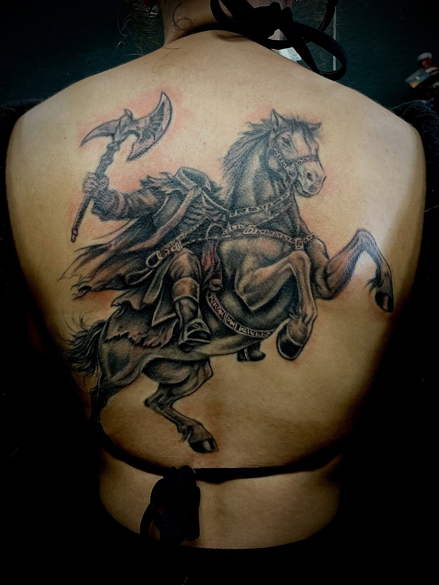 Warrior on horseback realism tattoo on the back by Cultura