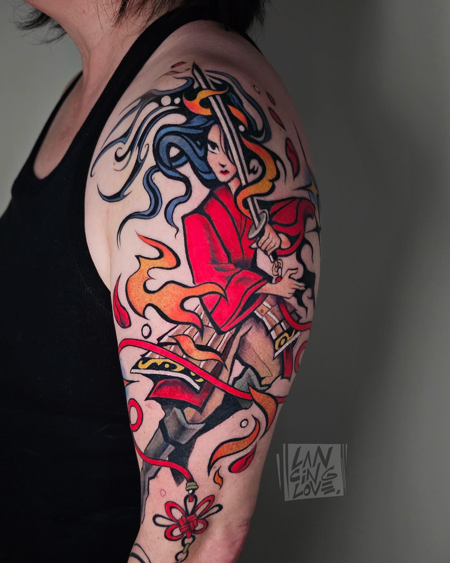 Anime warrior anime tattoo on the upper arm by Lancinglove
