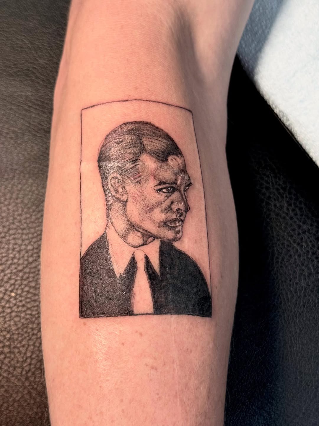 Tattoo by @noonchi_tattoos — realism, black_and_grey