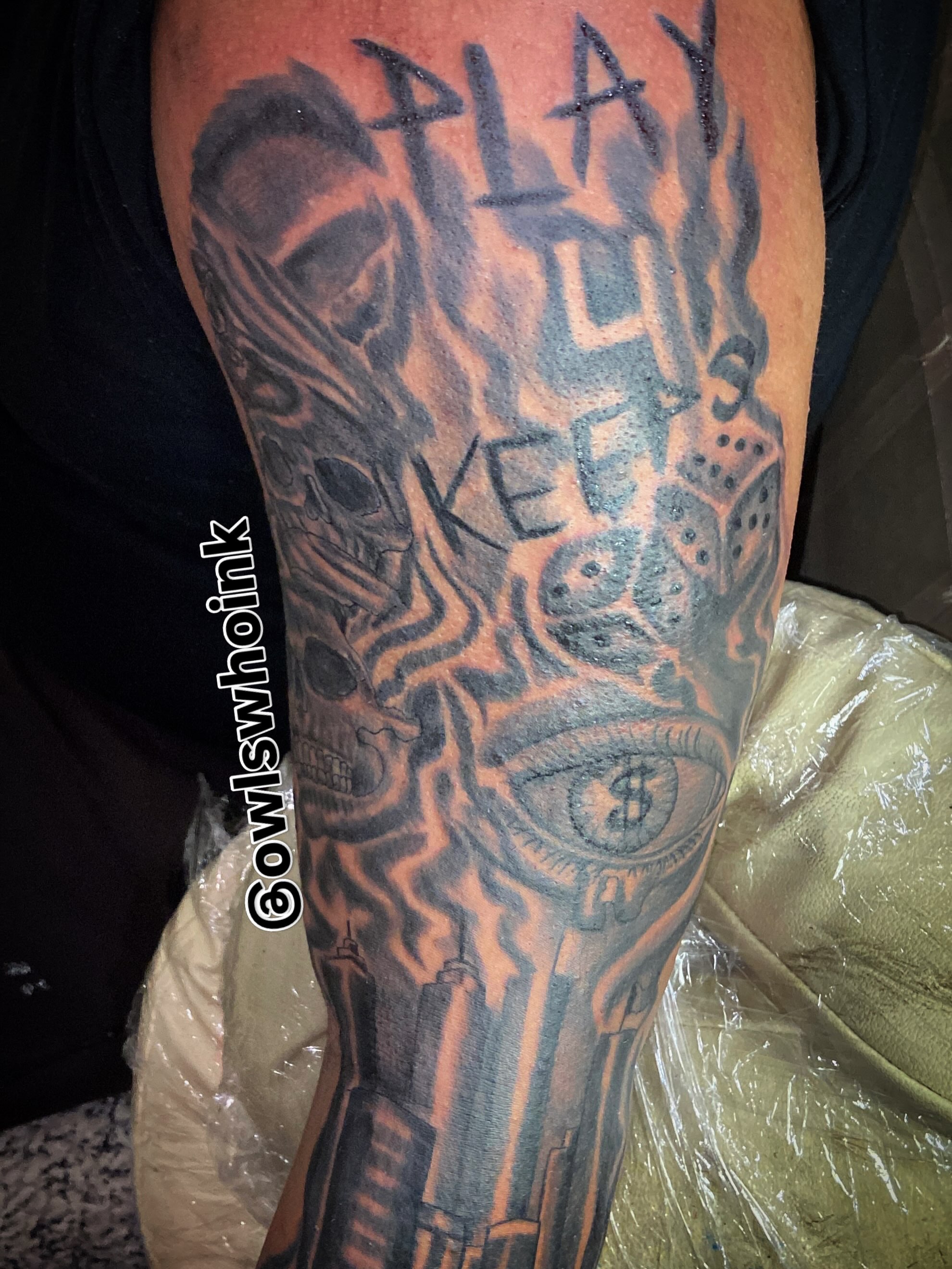 Cityscape with dice and eye neo-traditional tattoo on the forearm by OwlWhoINKs