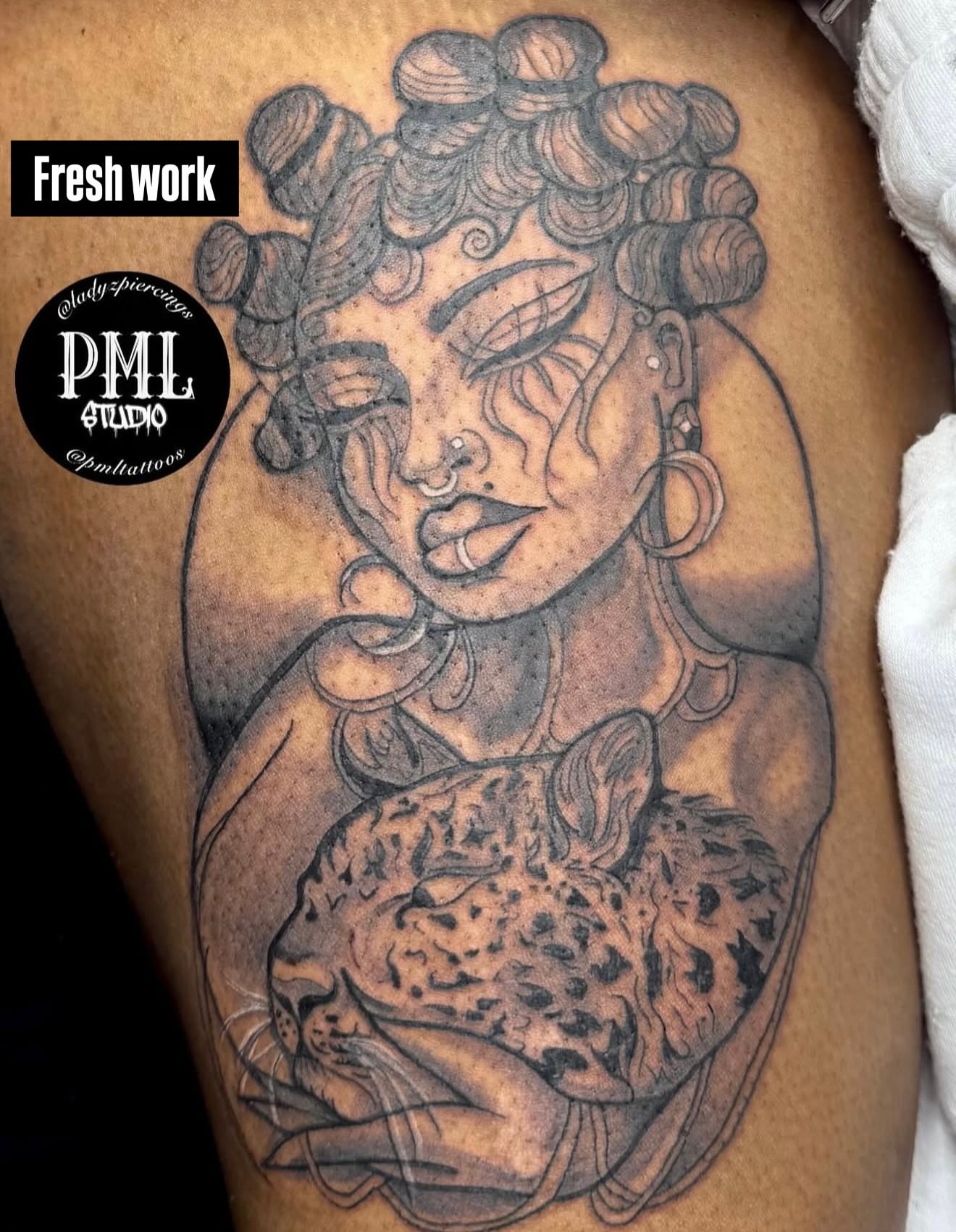 Woman with leopard realism tattoo on the thigh by PMLSTUDIO ✡️ Atlanta Licensed Artist, Decatur, Georgia