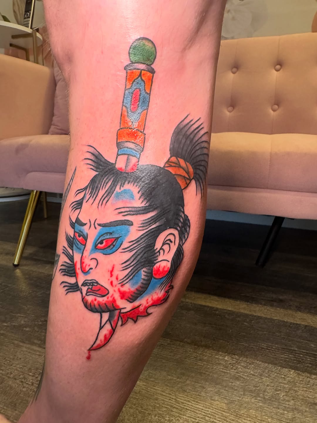 Samurai head with sword neo-traditional tattoo on the forearm by Kinzi Brown