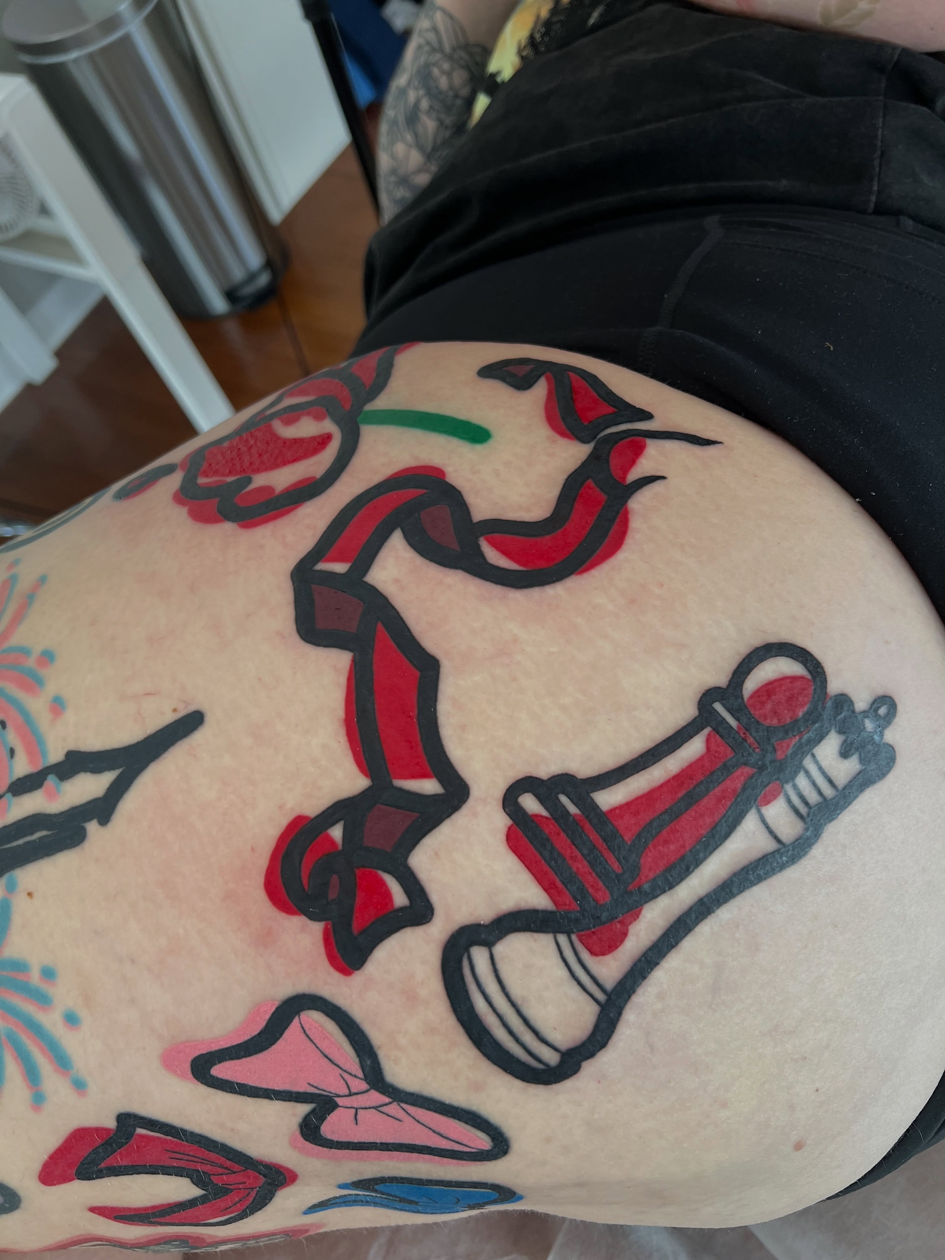 Violin American traditional tattoo on the thigh by Tattoo Artist