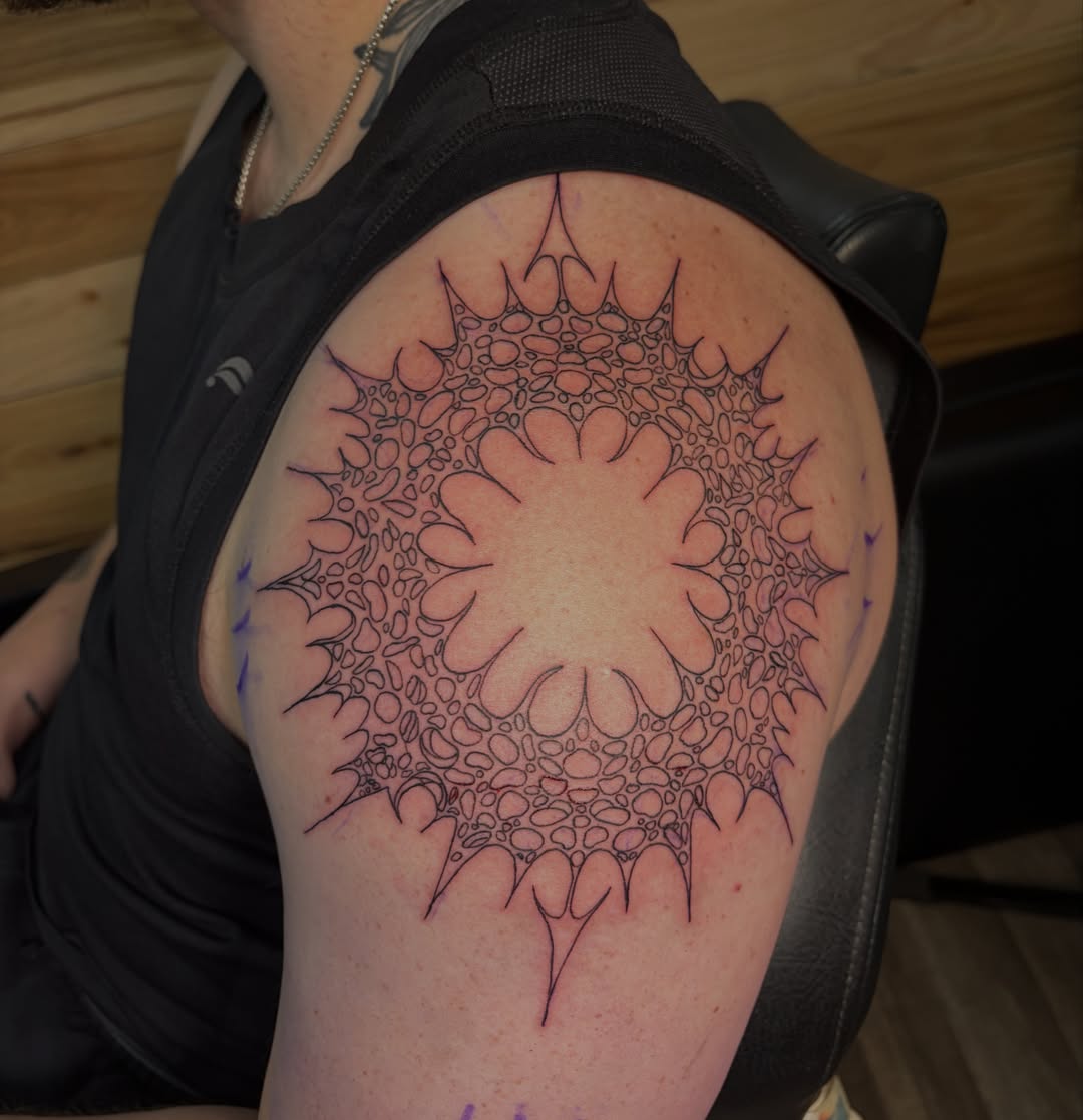 Geometric mandala geometric tattoo on the shoulder by Michelle