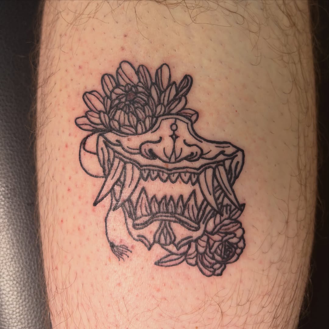 Chrysanthemum skull geometric tattoo on the forearm by Michelle