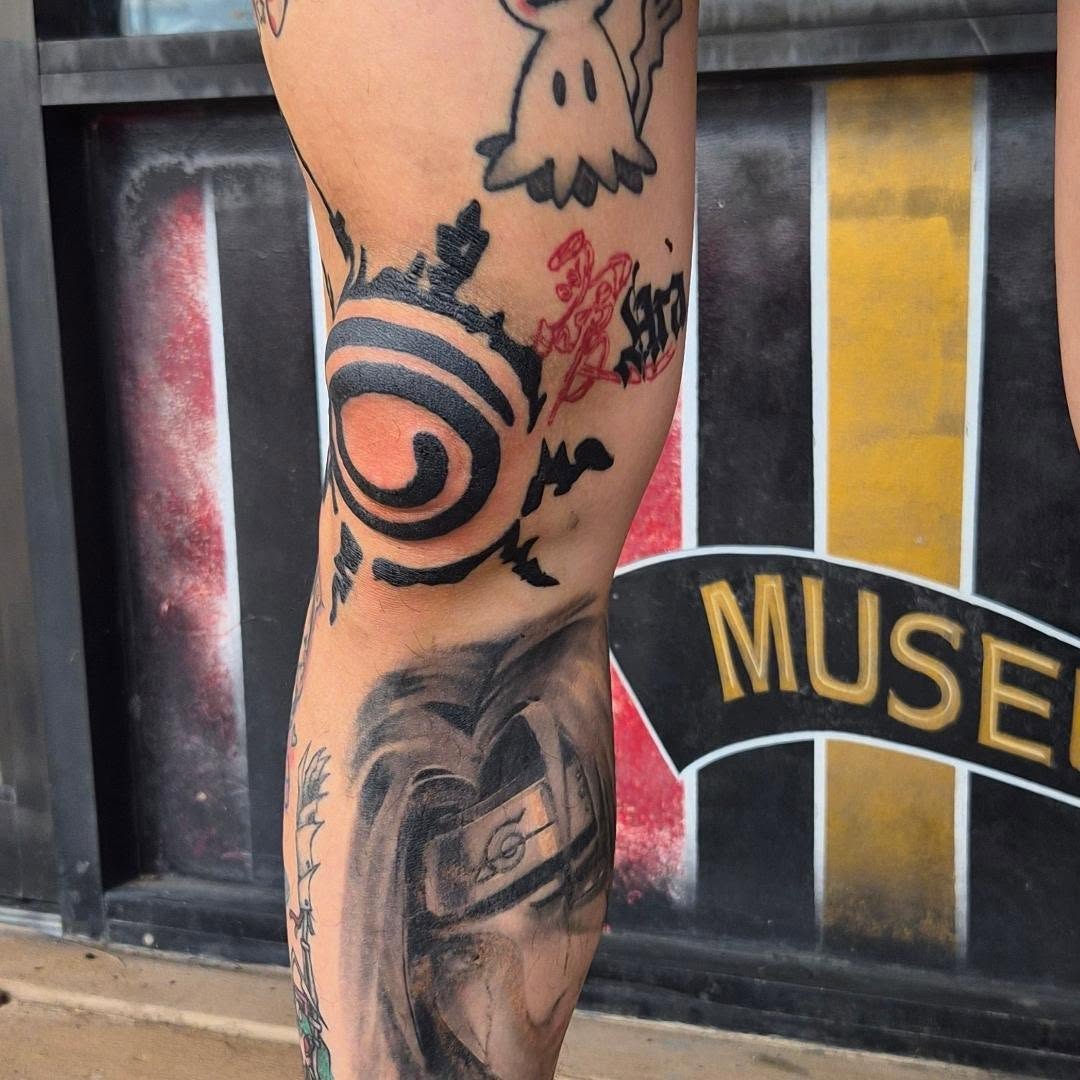Naruto character and abstract symbol tattoo on the forearm by Cielle