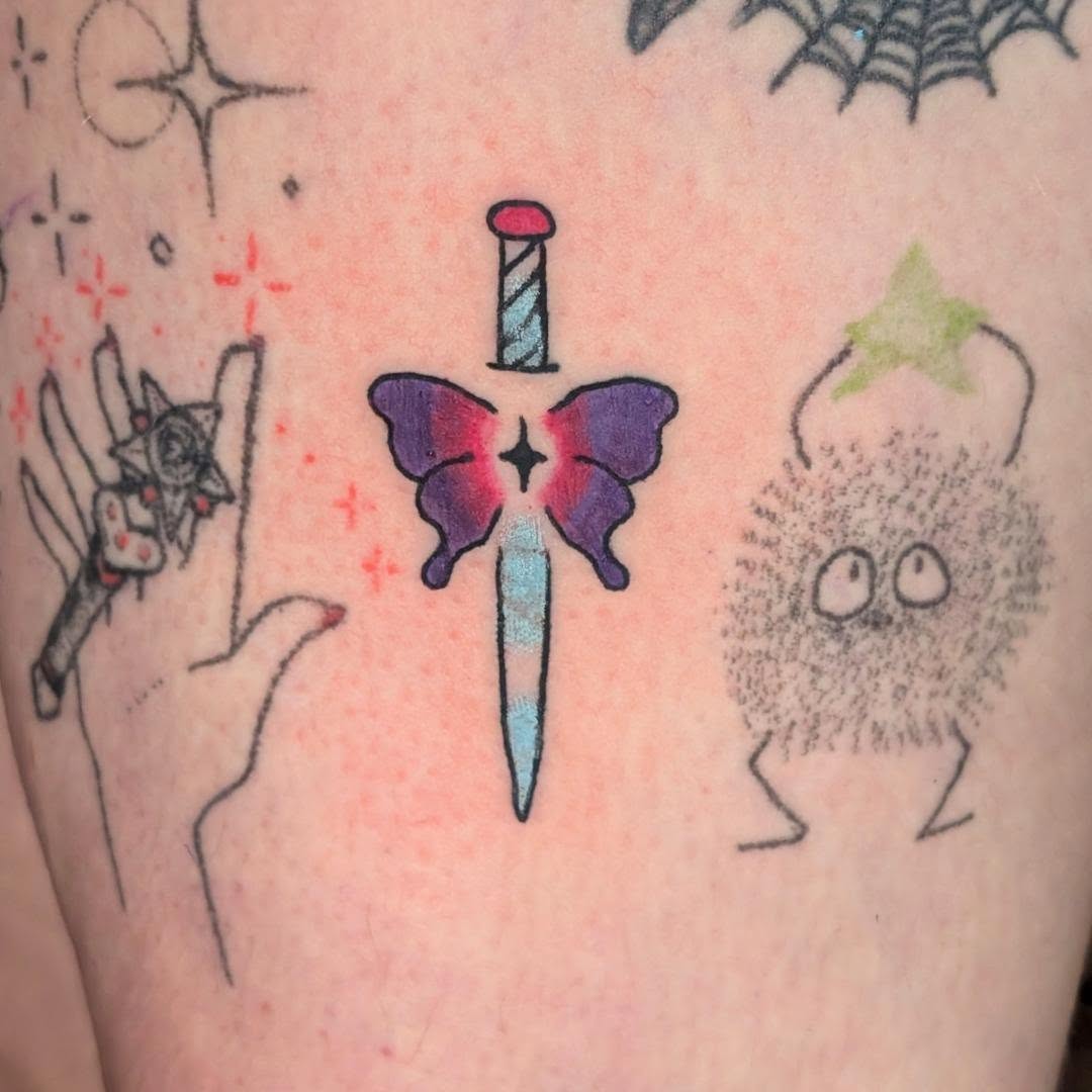 Butterfly sword geometric tattoo on the forearm by norn noszka