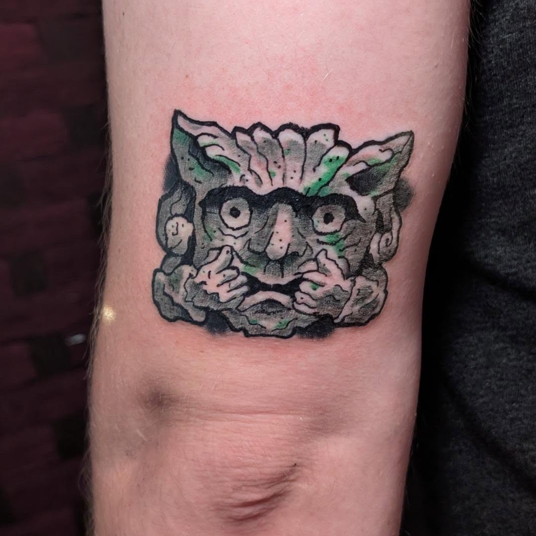 Mask dotwork tattoo on the forearm by norn noszka
