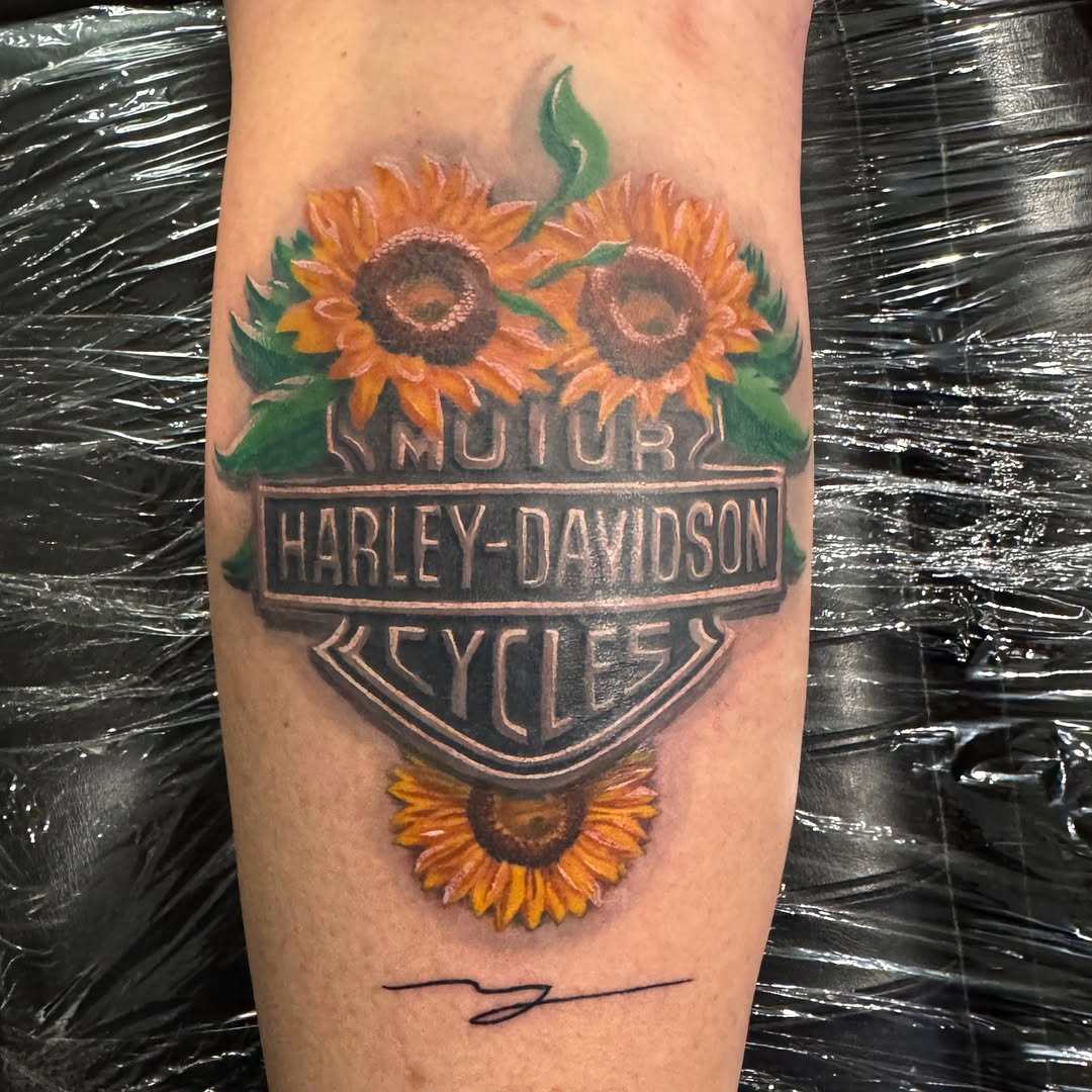 Sunflowers realism tattoo on the forearm by marcus labonne